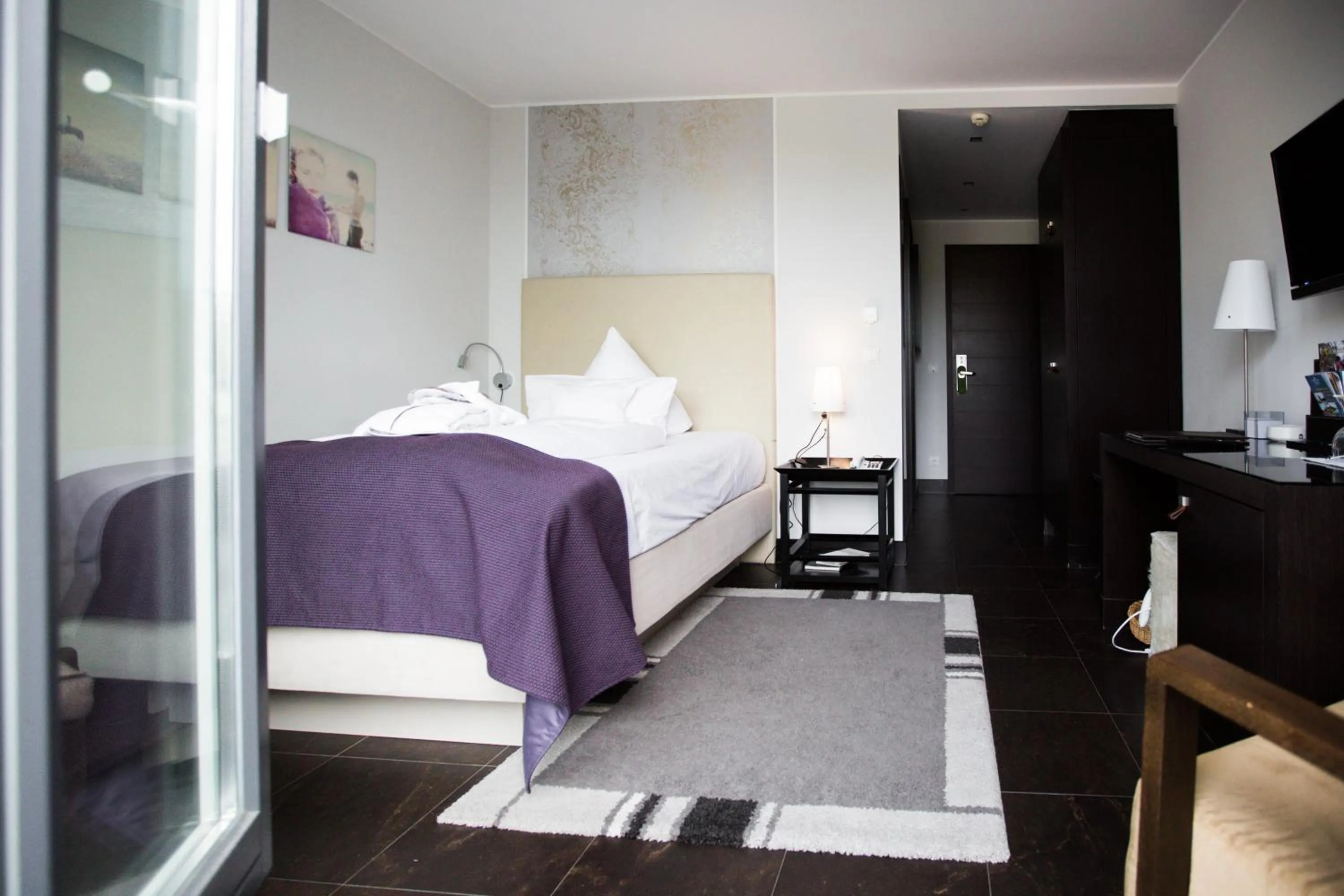 Bed in Hotel Künstlerquartier Seezeichen