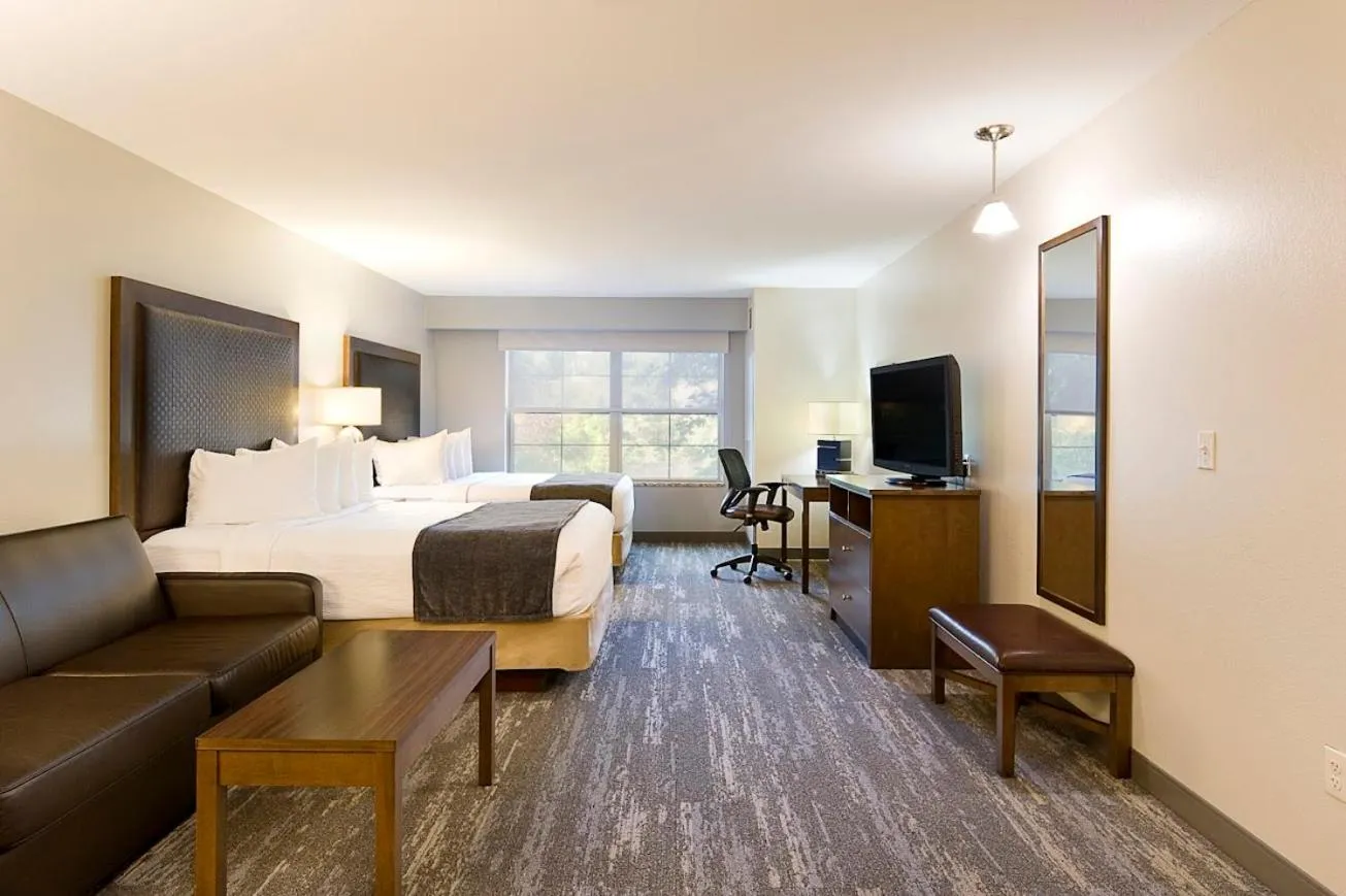 Bed in ClubHouse Hotel and Suites