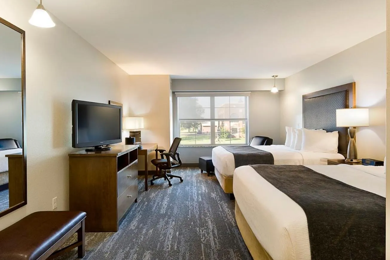 Bed in ClubHouse Hotel and Suites