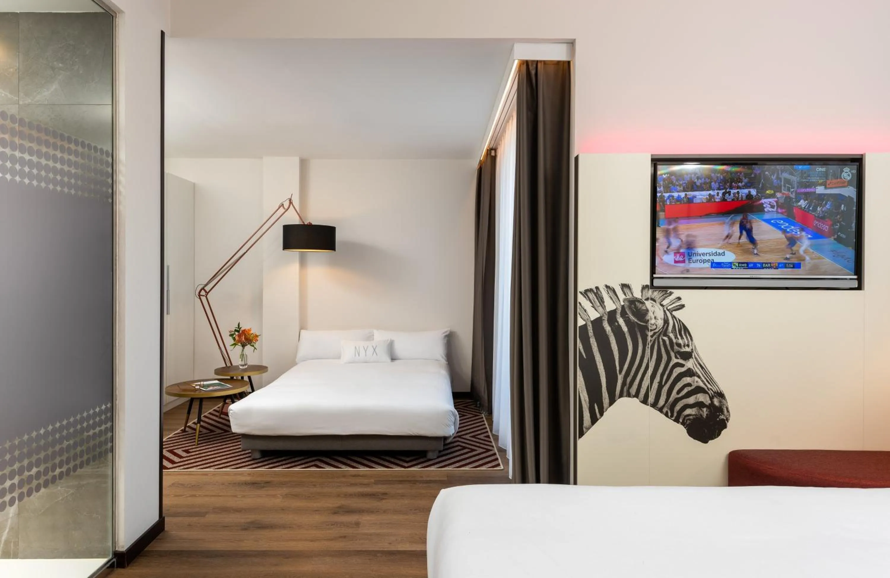 Photo of the whole room, Bed in NYX Hotel Bilbao by Leonardo Hotels