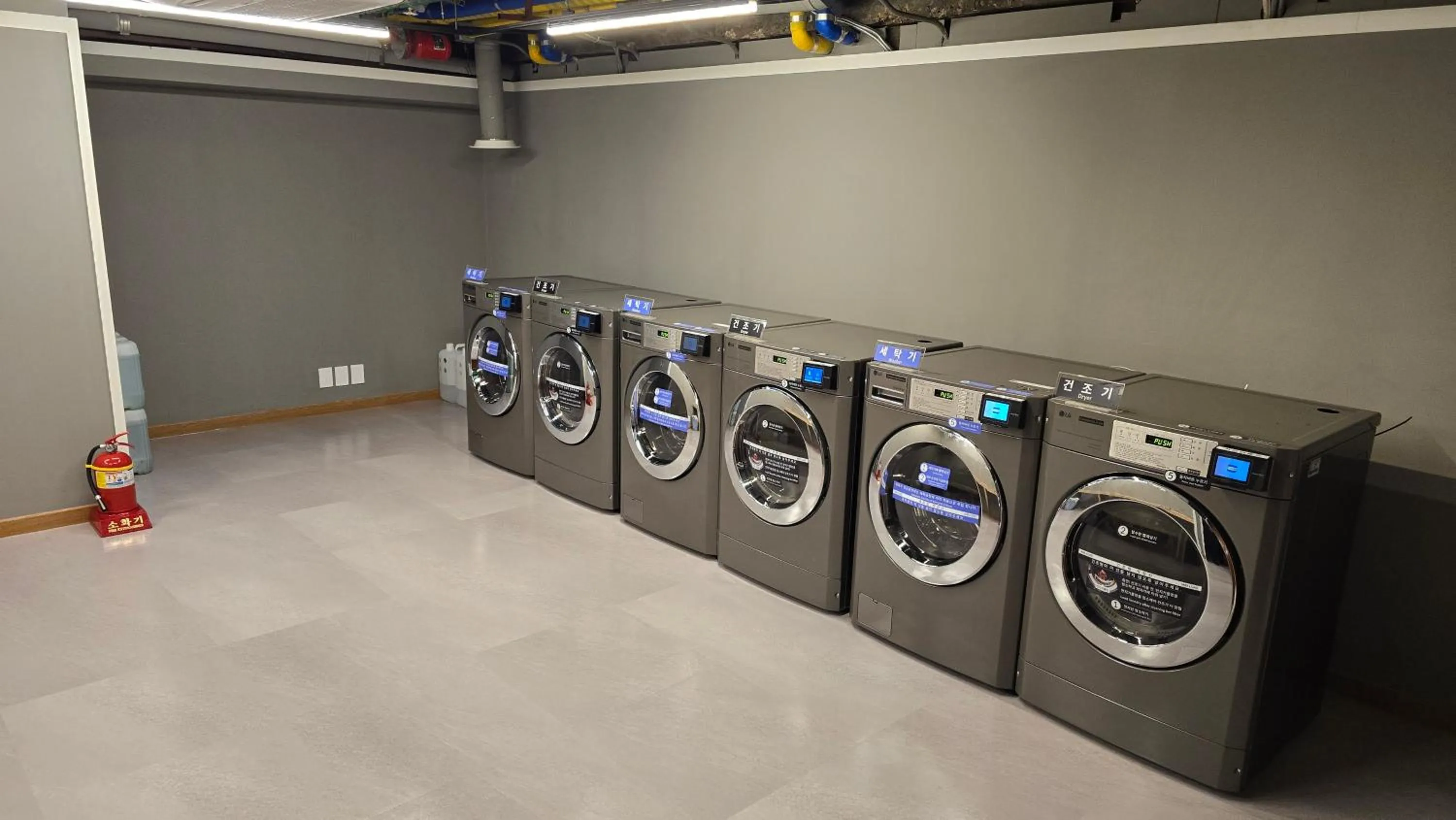 washing machine in Pacific Hotel