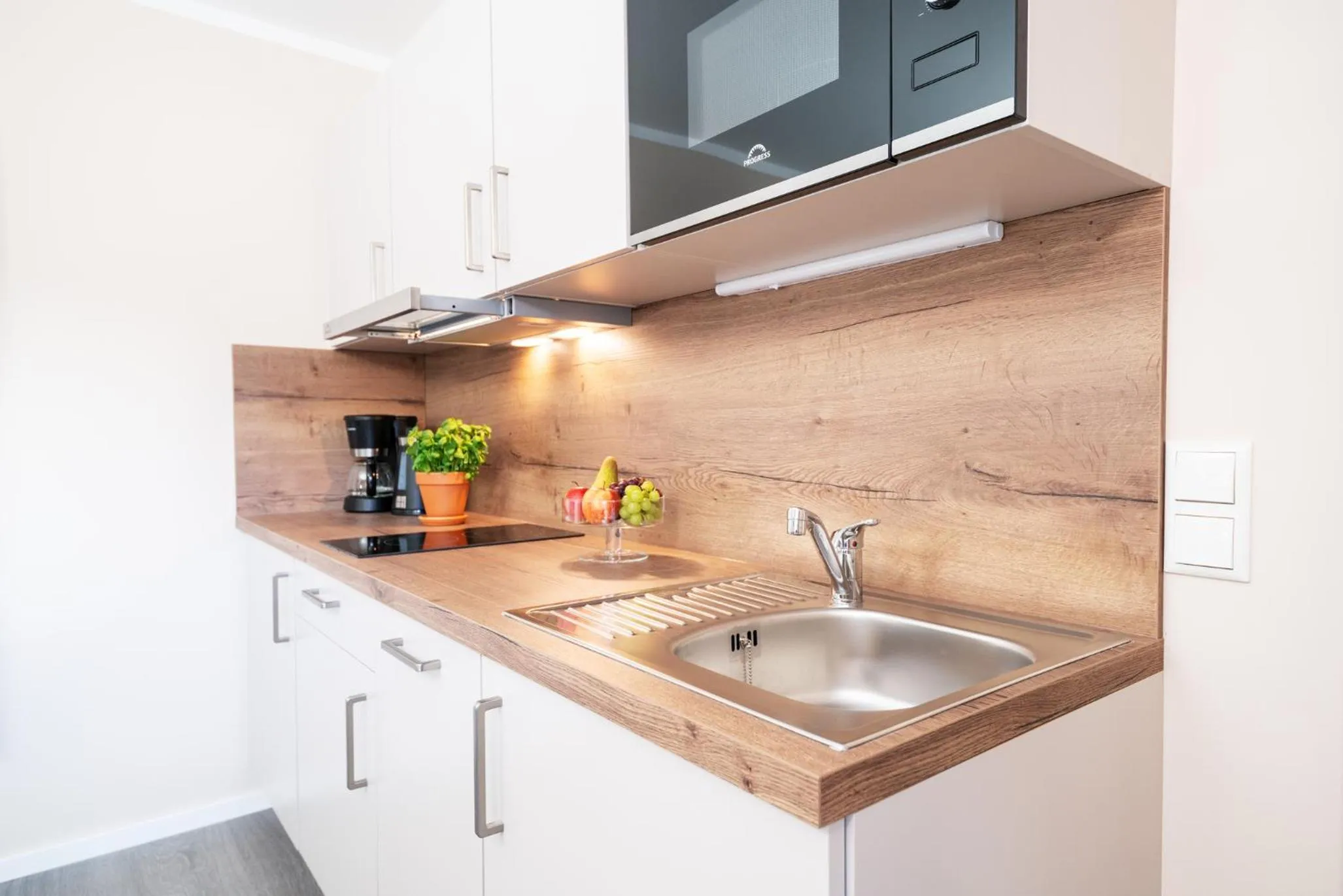 Kitchen or kitchenette in AKZENT Apartmenthotel Binz