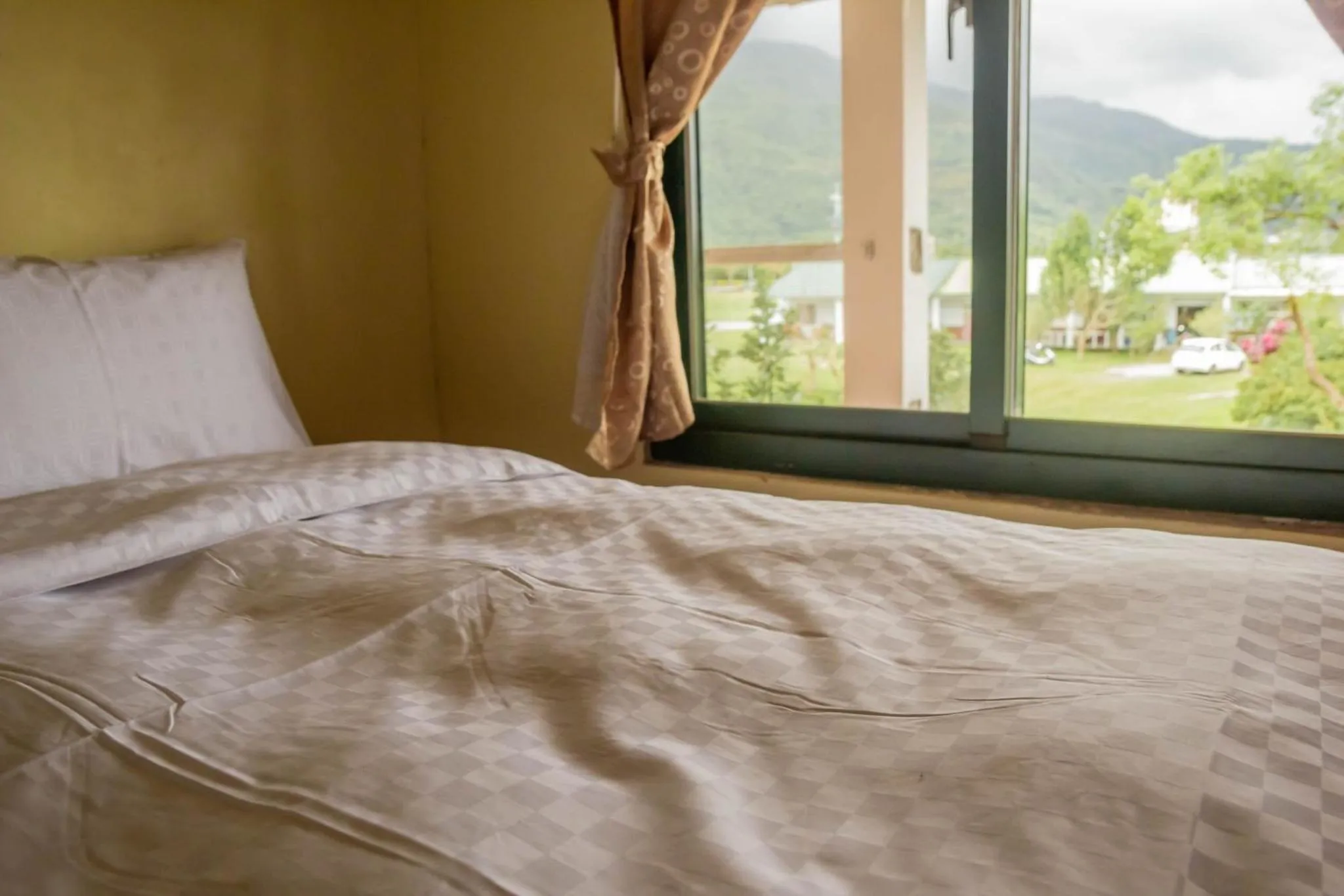 Bed in 鄉村民宿&庭園民宿