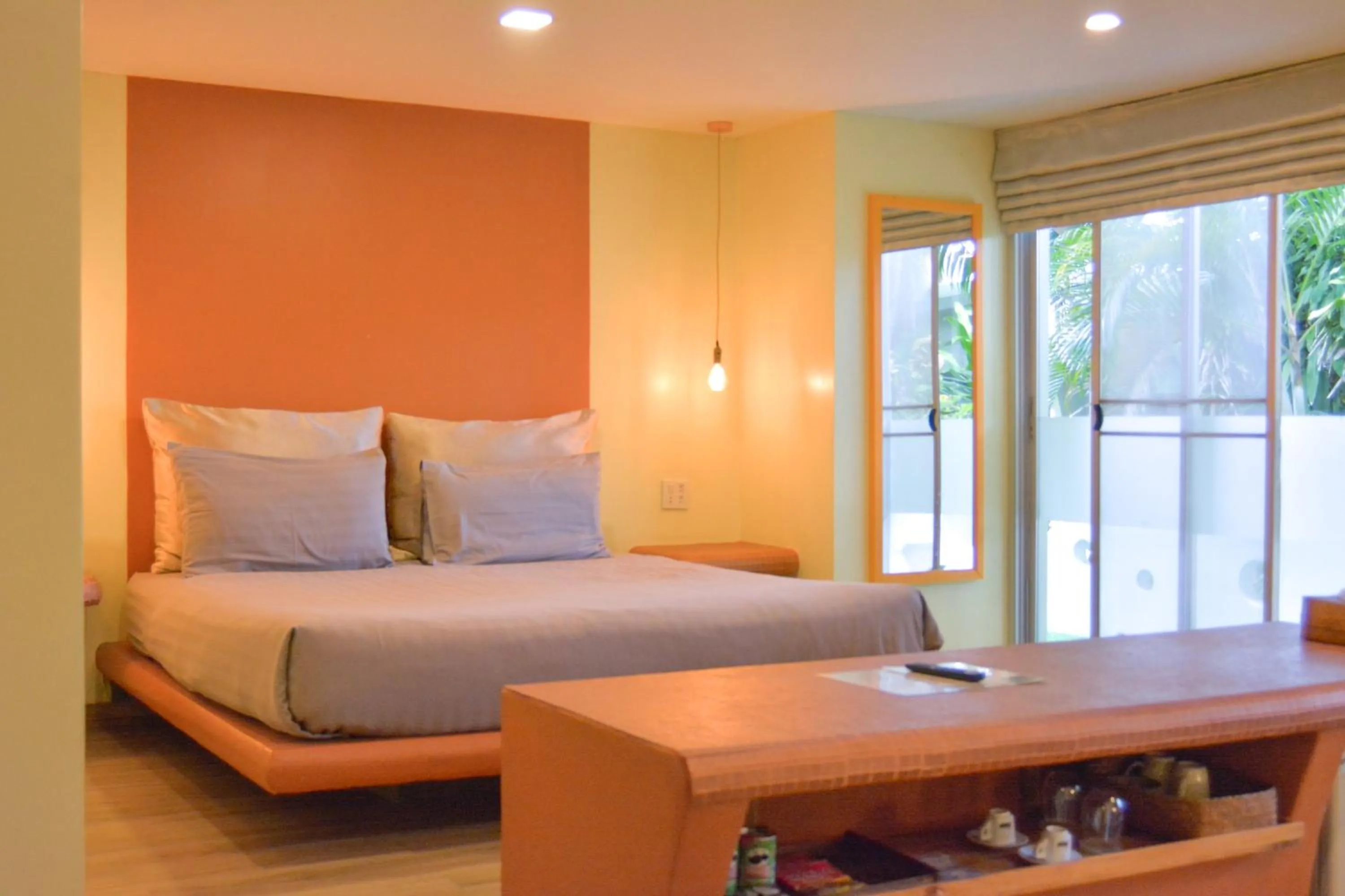 Bed in Le Divine Comedie Beach Resort