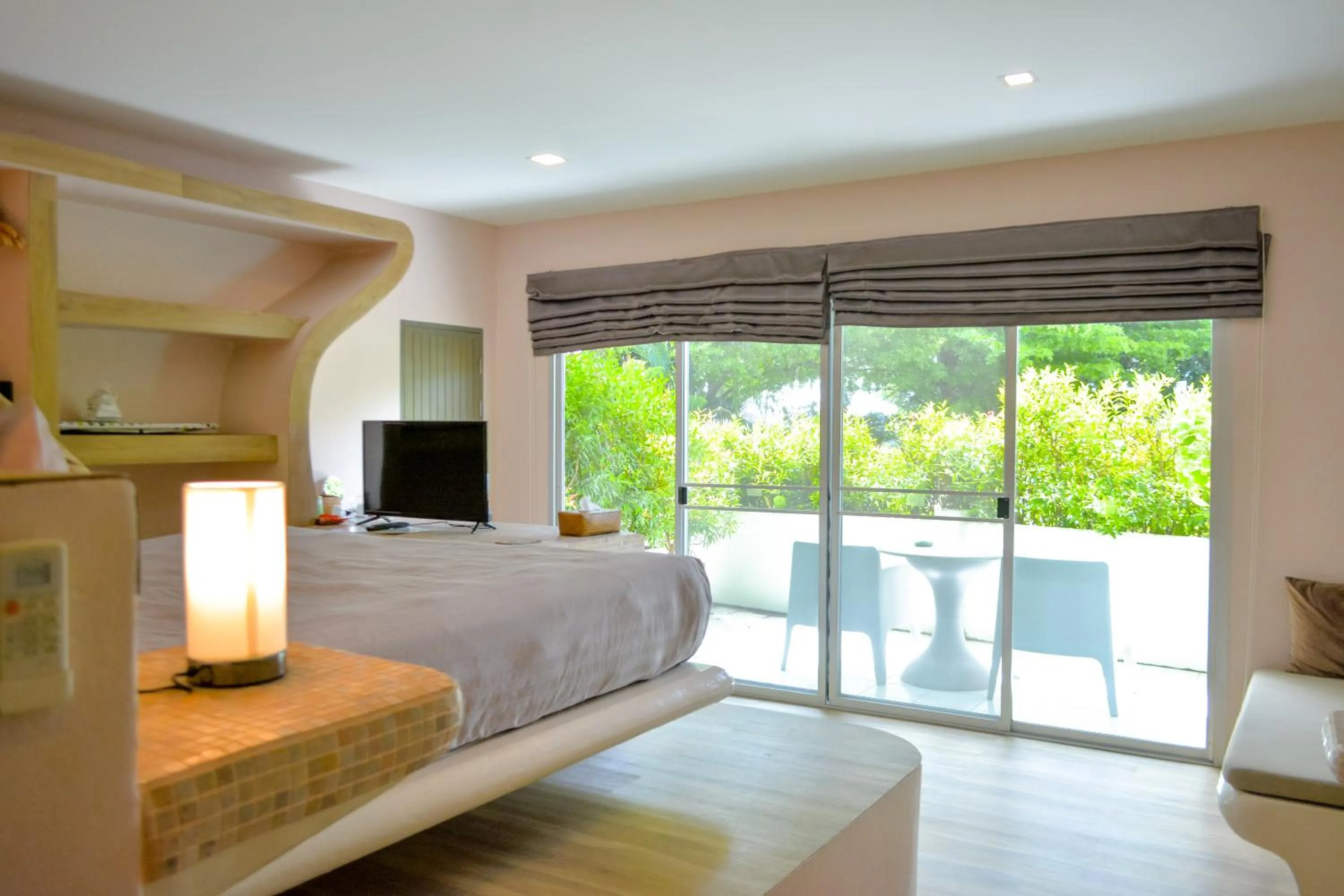 Bed in Le Divine Comedie Beach Resort