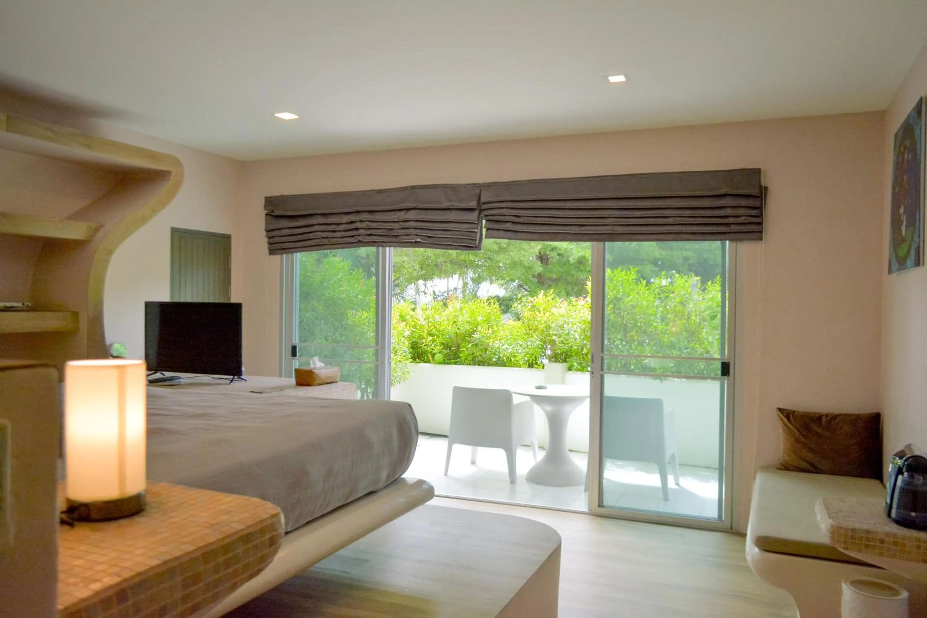 Bed in Le Divine Comedie Beach Resort