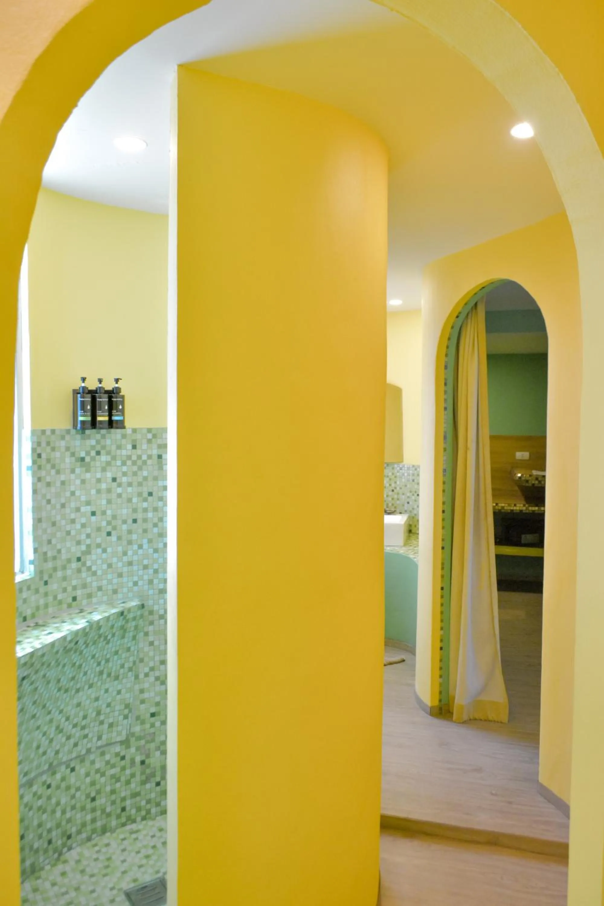 Bed in Le Divine Comedie Beach Resort