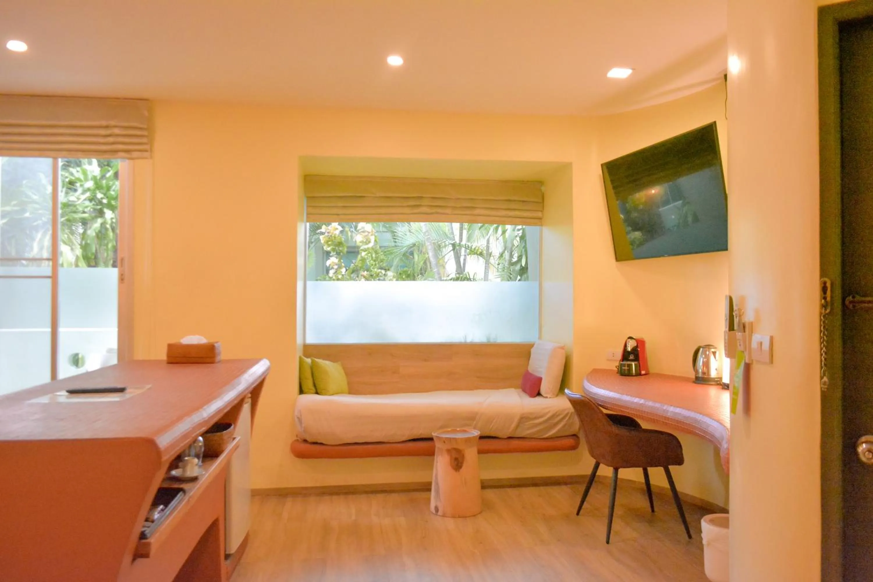 Bed in Le Divine Comedie Beach Resort