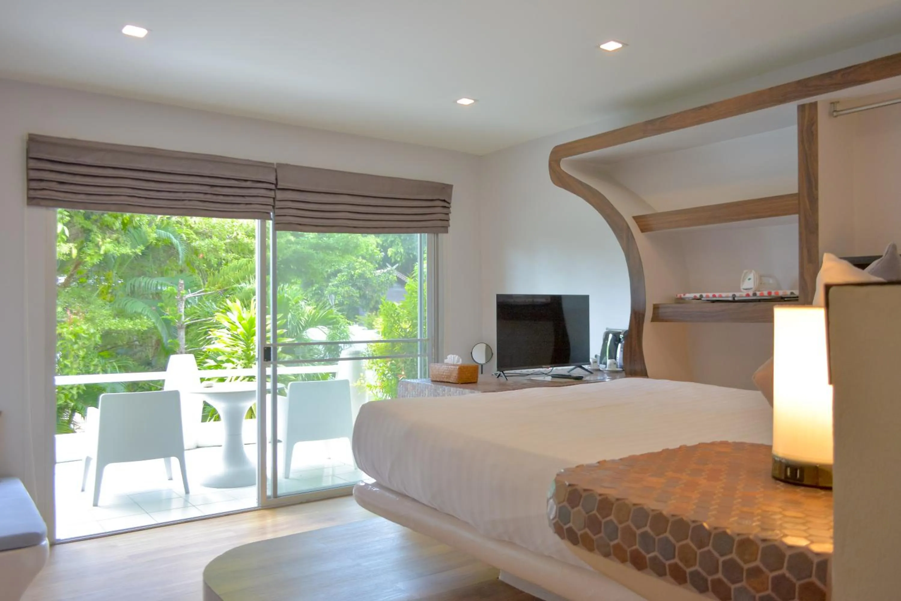 Bed in Le Divine Comedie Beach Resort