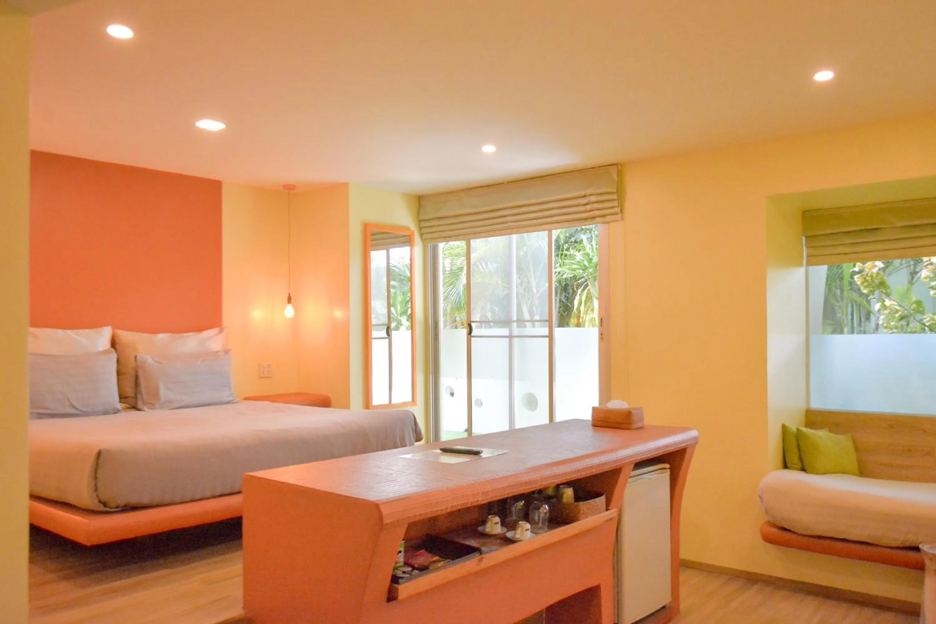 Bed in Le Divine Comedie Beach Resort