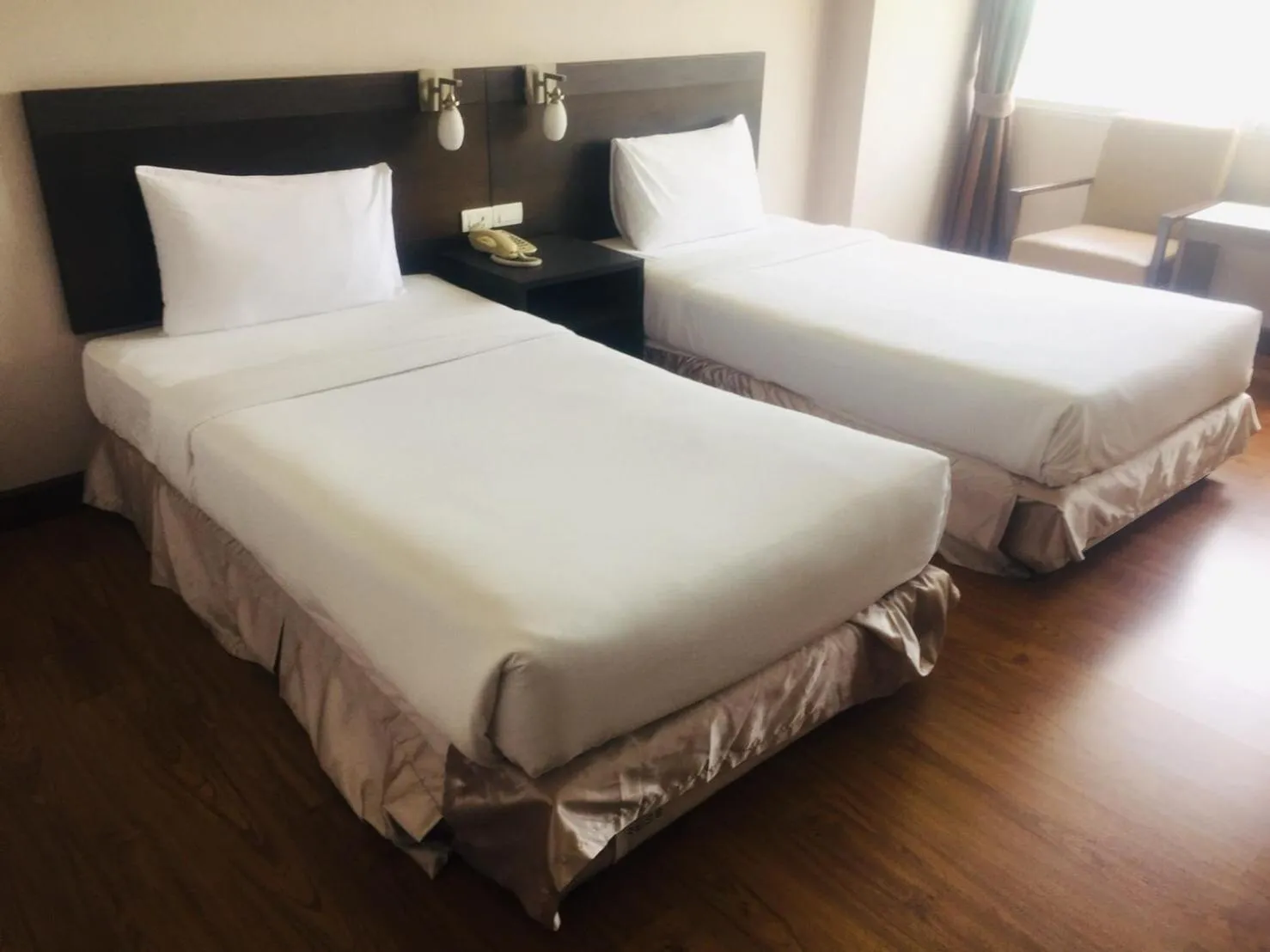 Bed in SinKiat Buri Hotel