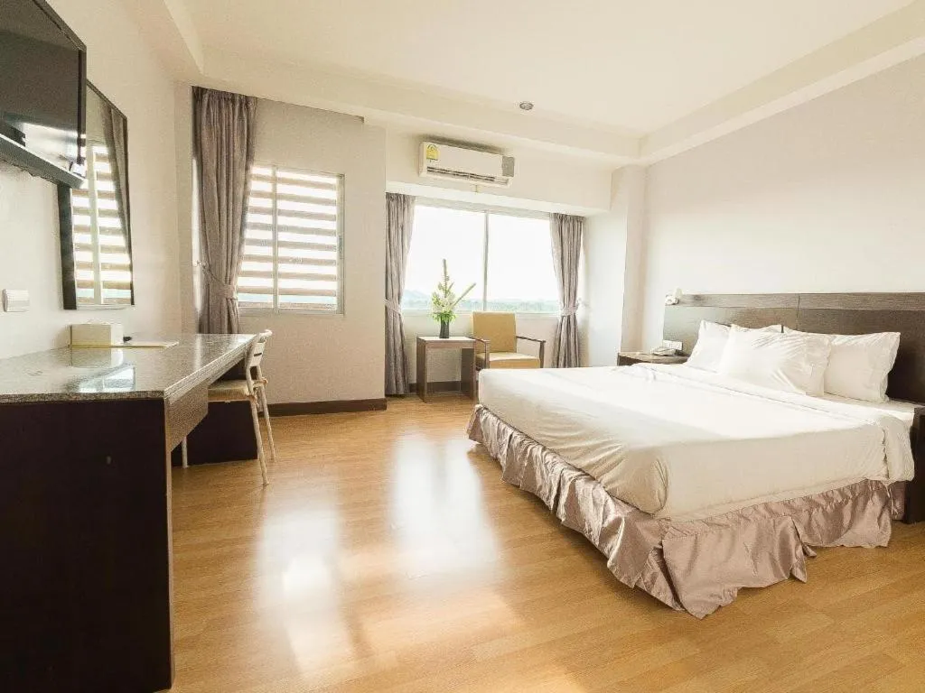 Bed in SinKiat Buri Hotel