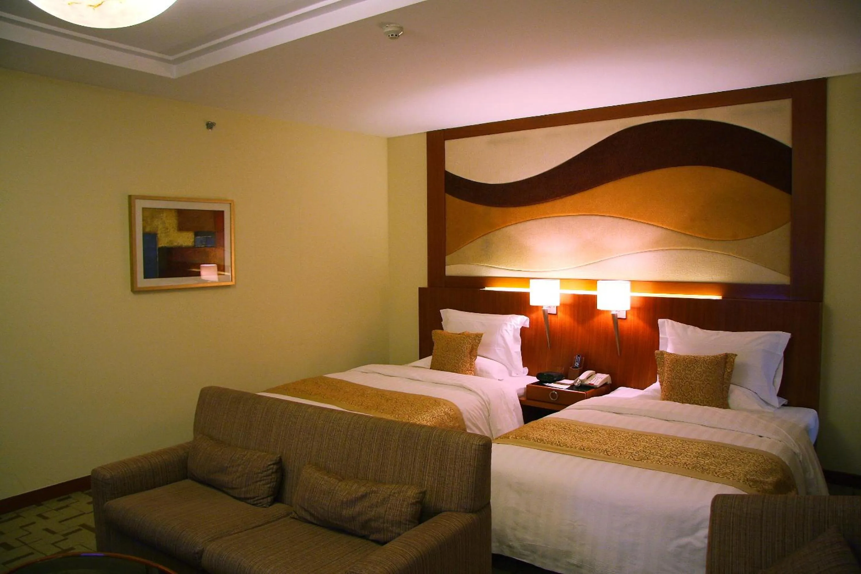 Bed in Jianguo Garden Hotel