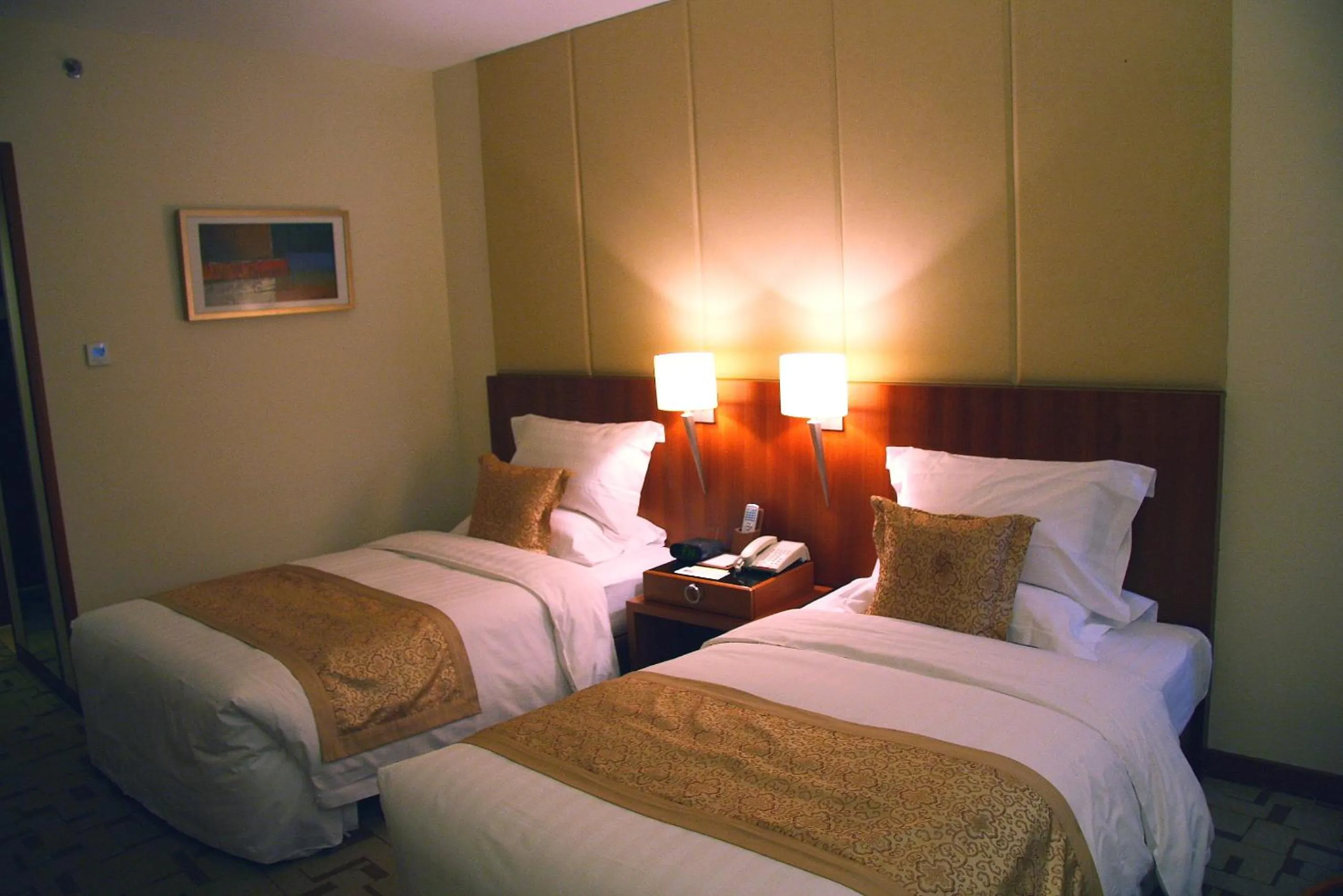 Bed in Jianguo Garden Hotel