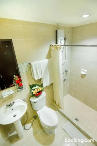 Bathroom in Rajah Park Hotel by Hiverooms