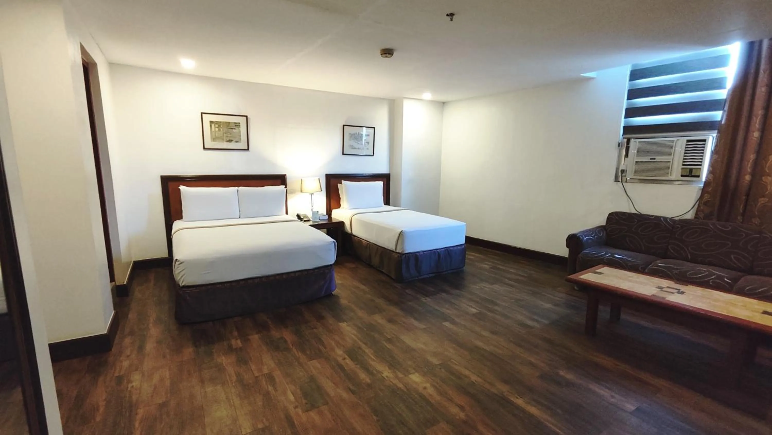 Bed in Rajah Park Hotel by Hiverooms