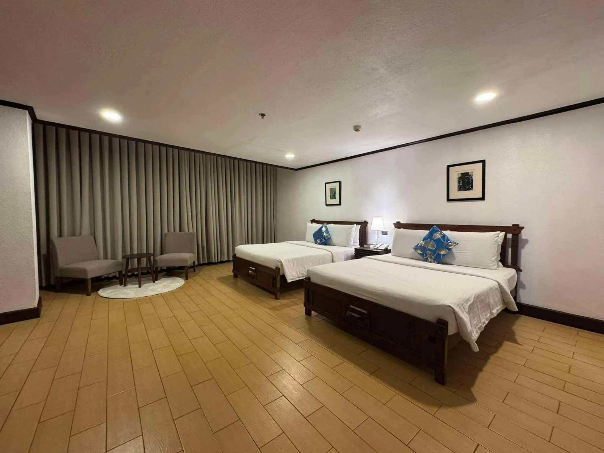 Bed in Rajah Park Hotel by Hiverooms