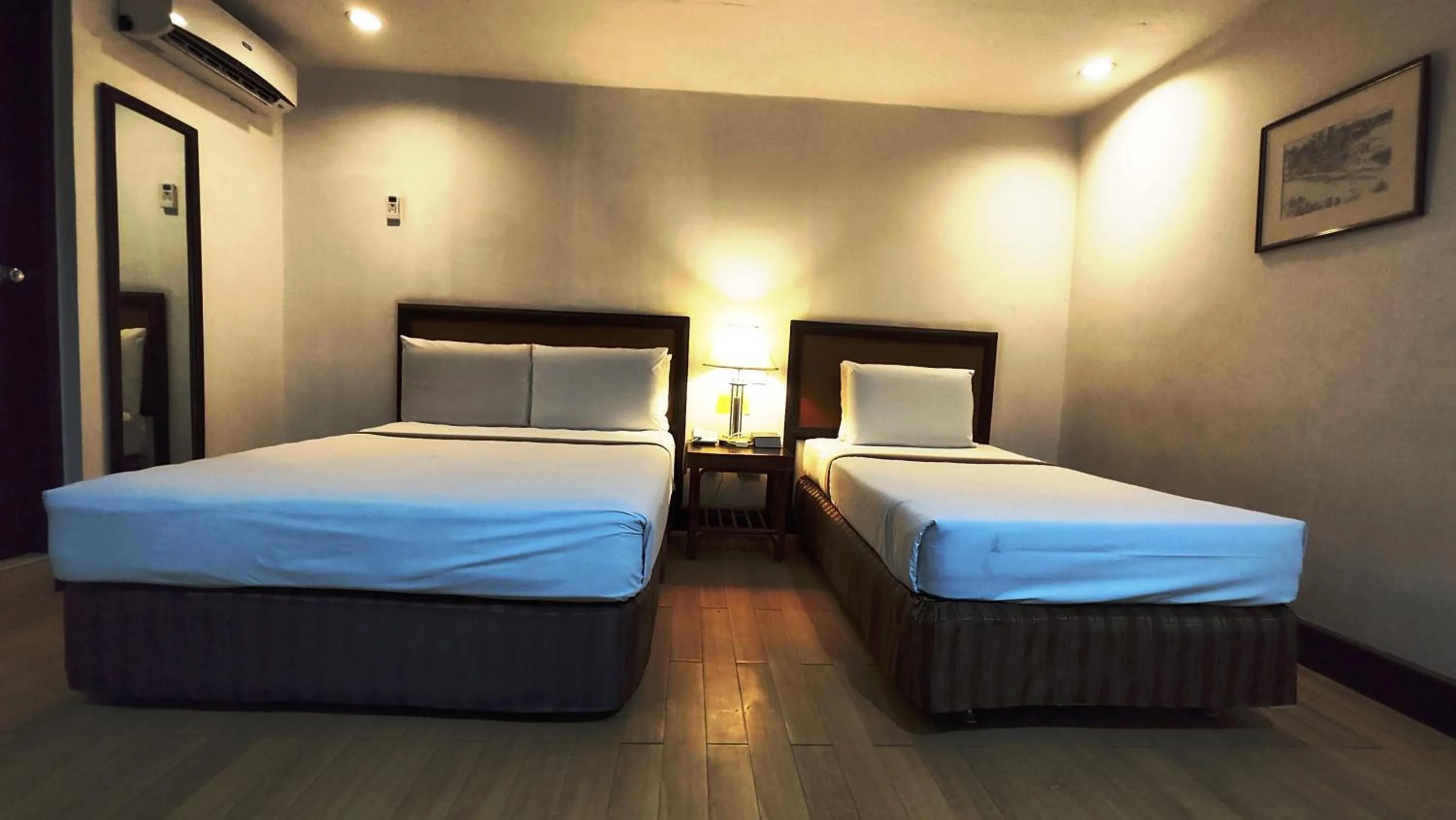 Bed in Rajah Park Hotel by Hiverooms