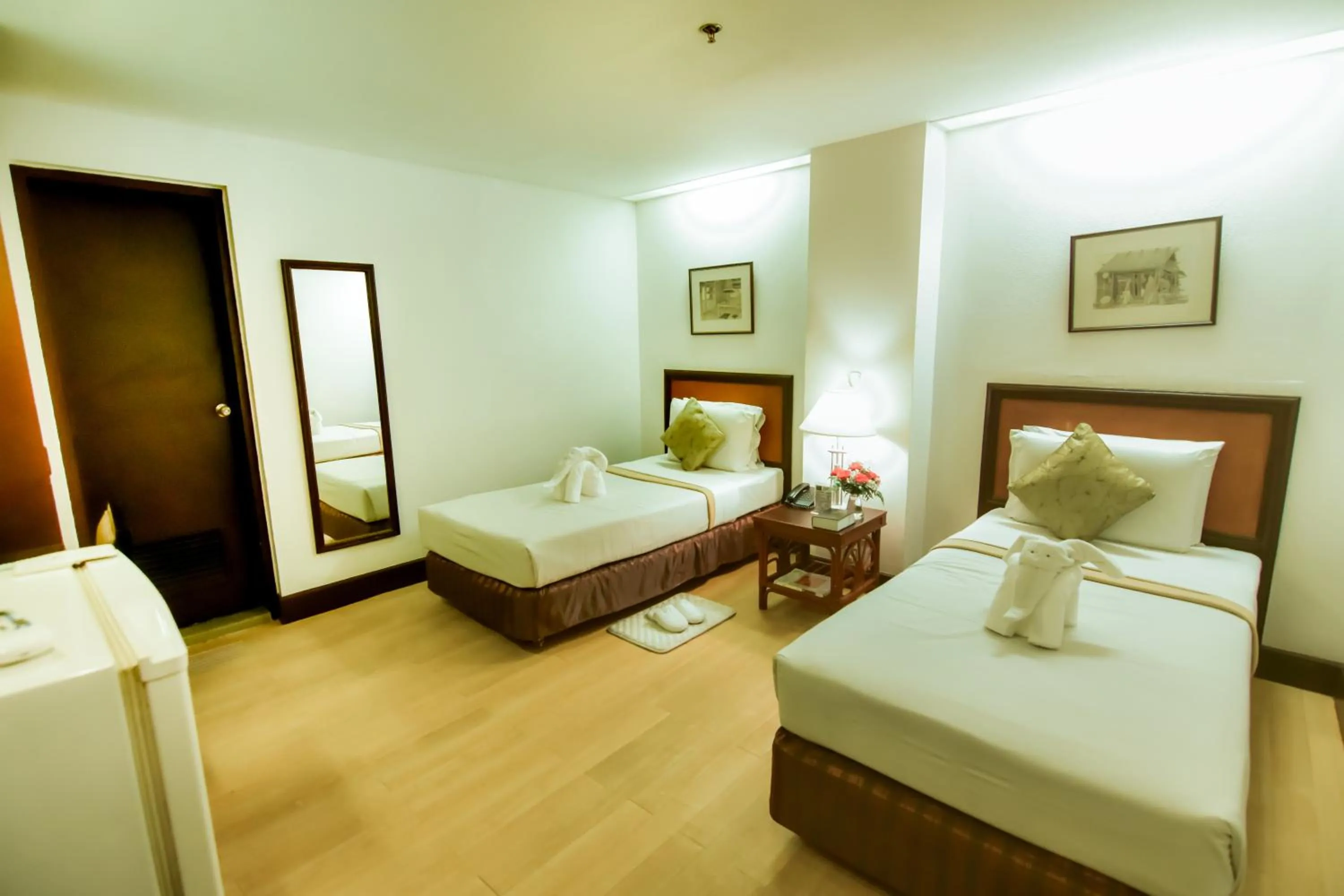 Photo of the whole room, Bed in Rajah Park Hotel by Hiverooms