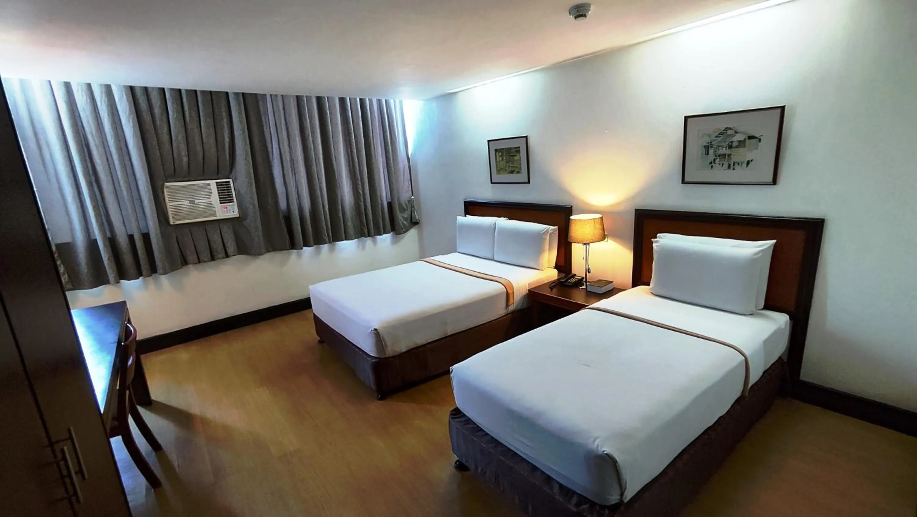 Bed in Rajah Park Hotel by Hiverooms