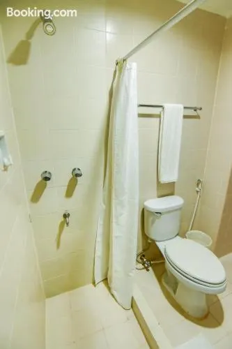 Bathroom in Rajah Park Hotel by Hiverooms