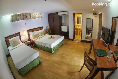 Bedroom, Bed in Rajah Park Hotel by Hiverooms