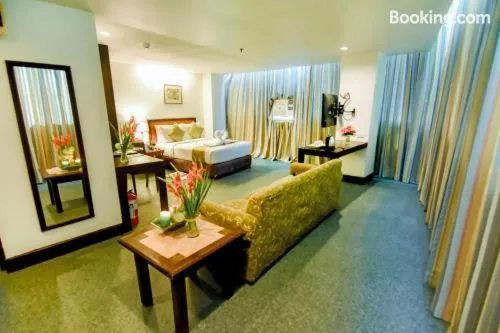 Photo of the whole room, Bed in Rajah Park Hotel by Hiverooms