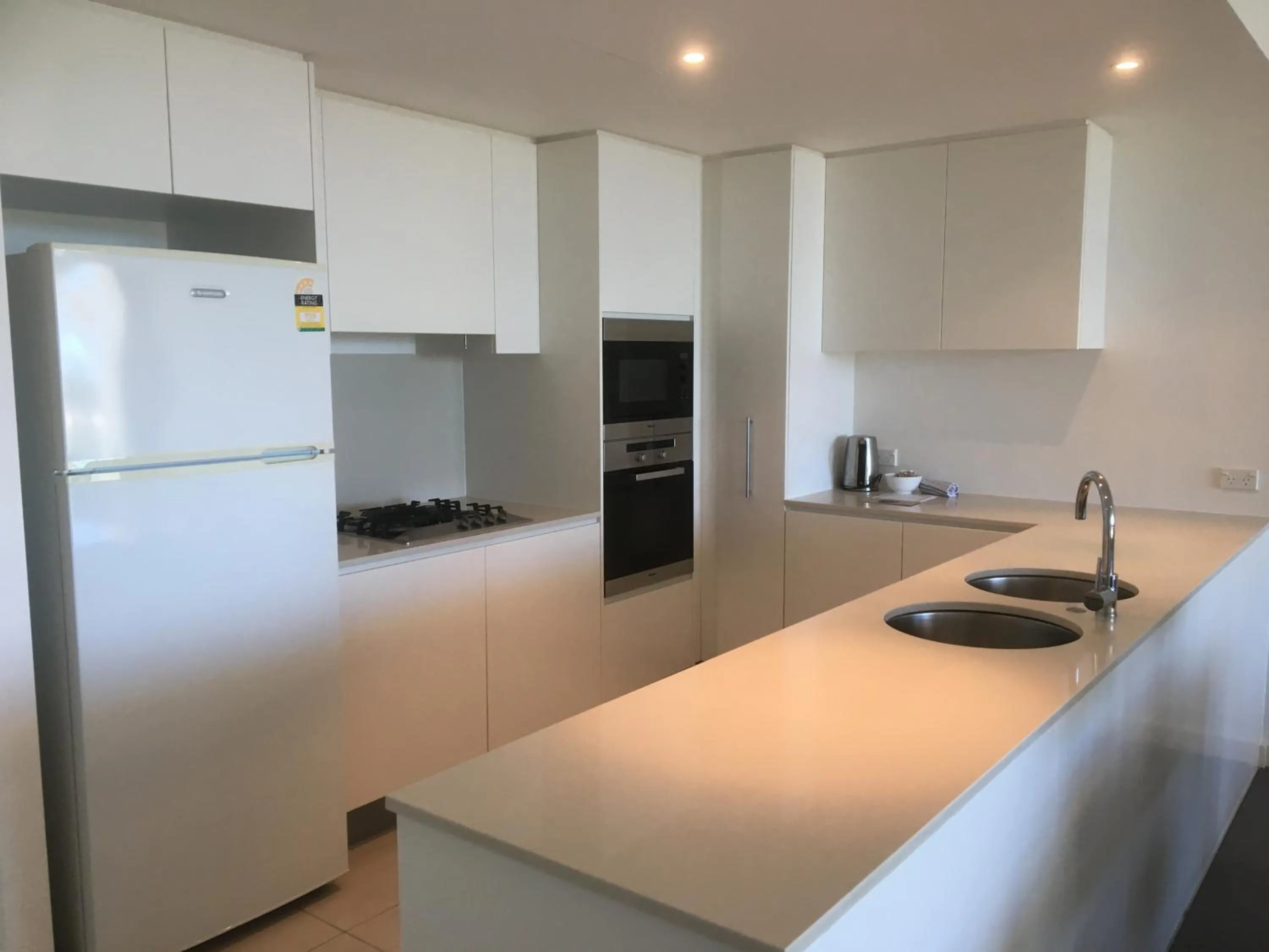 Kitchen or kitchenette in Kirra Surf Apartments