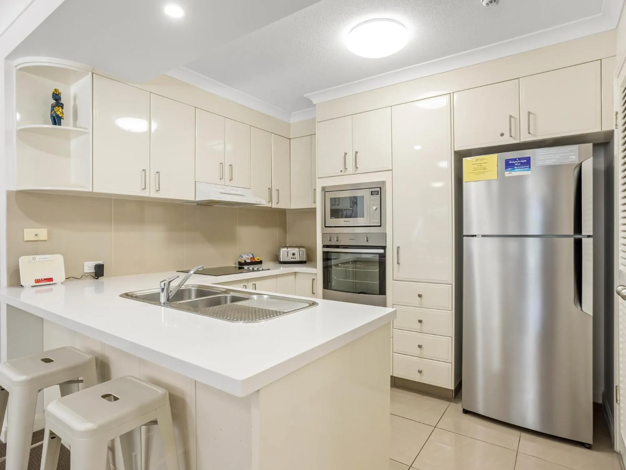 Kitchen or kitchenette in ULTIQA Burleigh Mediterranean Resort