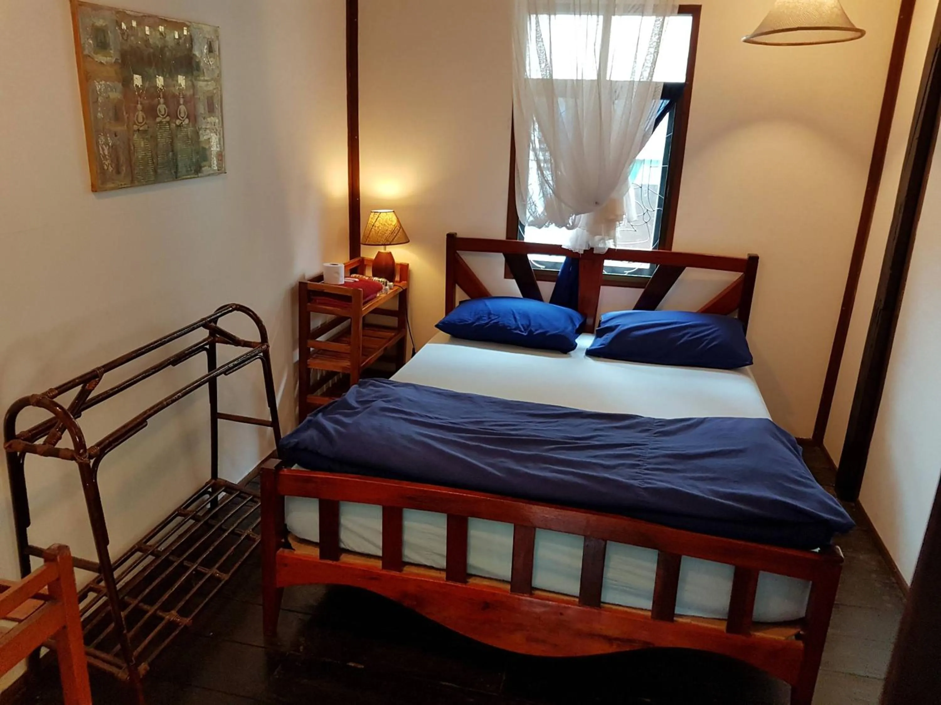 Bed in Mut Mee Garden Guest House