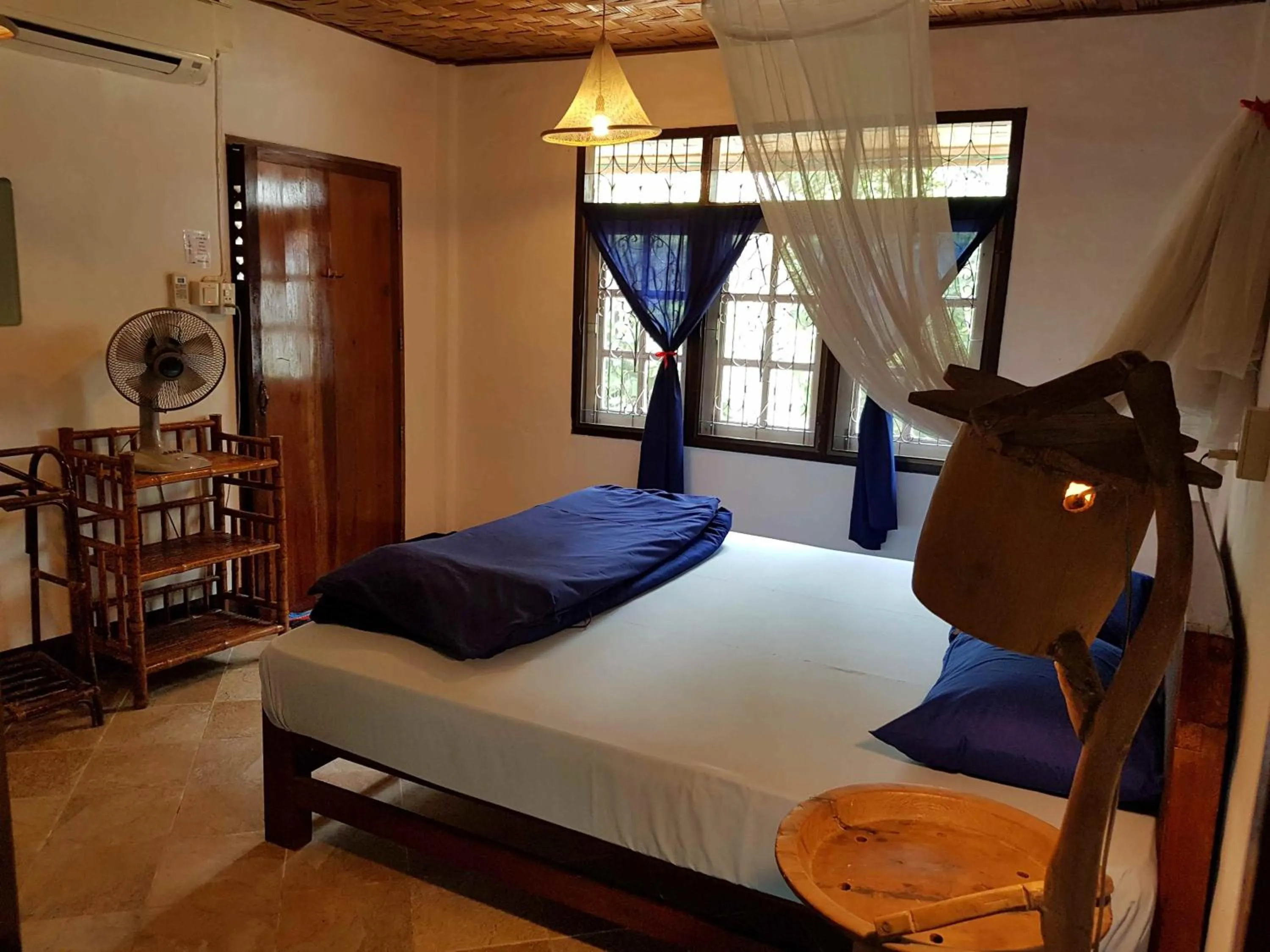 Bed in Mut Mee Garden Guest House