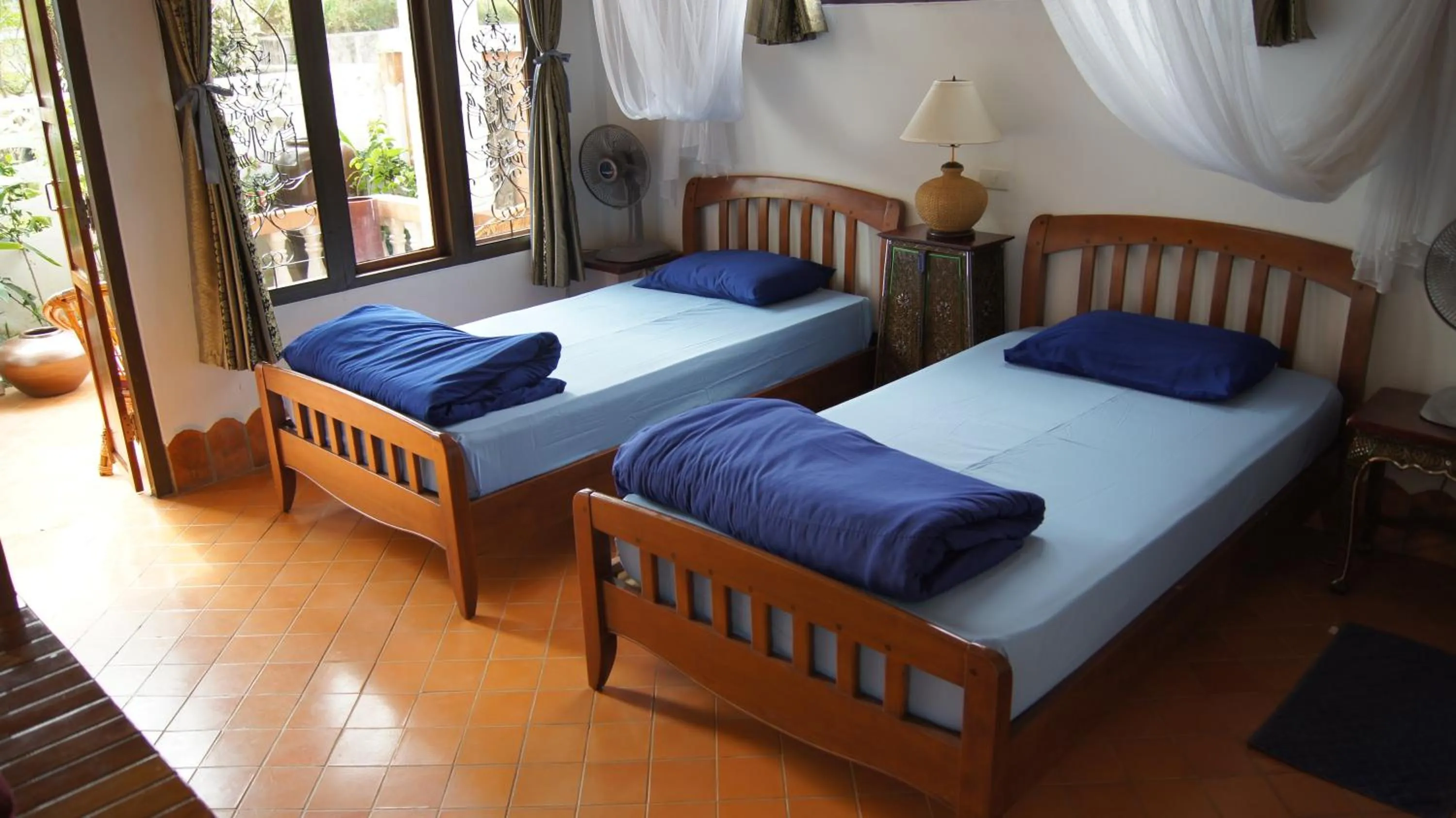 Photo of the whole room, Bed in Mut Mee Garden Guest House