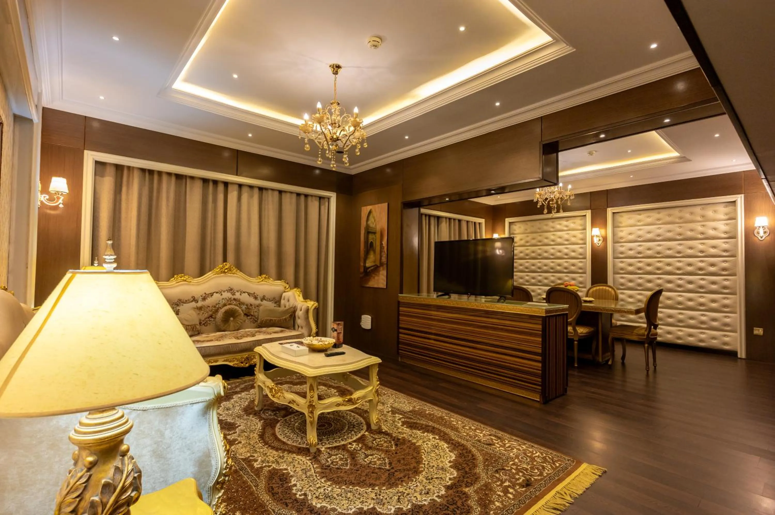 Living room, Bed in Ras Al Khaimah Hotel