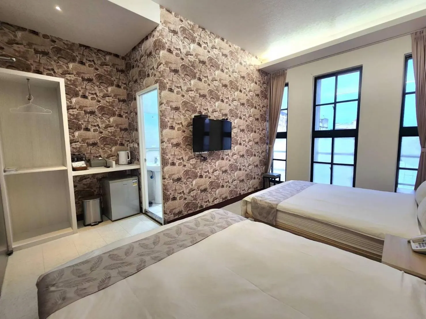 Bed in Jia-Jia Business Hotel