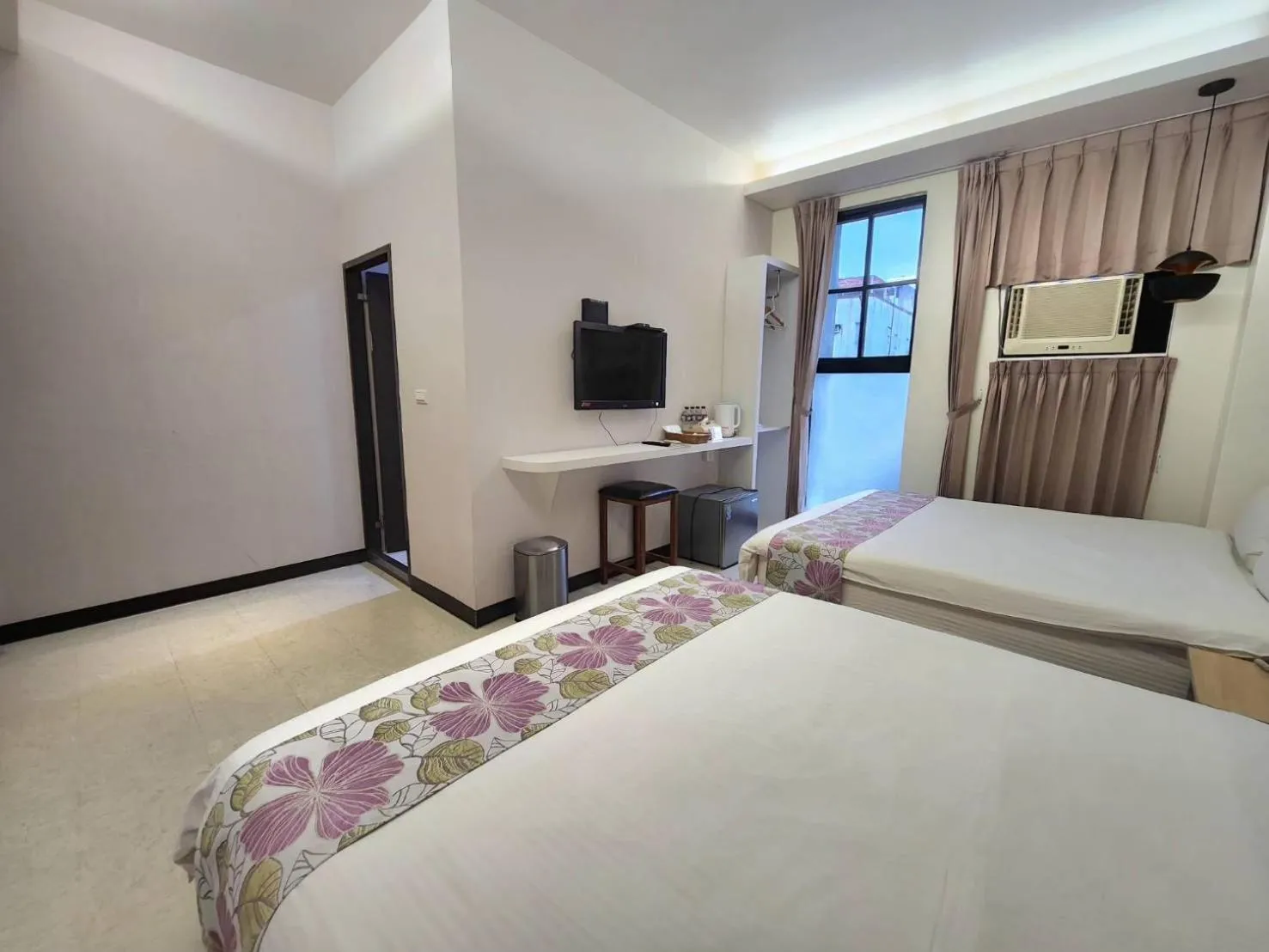 Bed in Jia-Jia Business Hotel