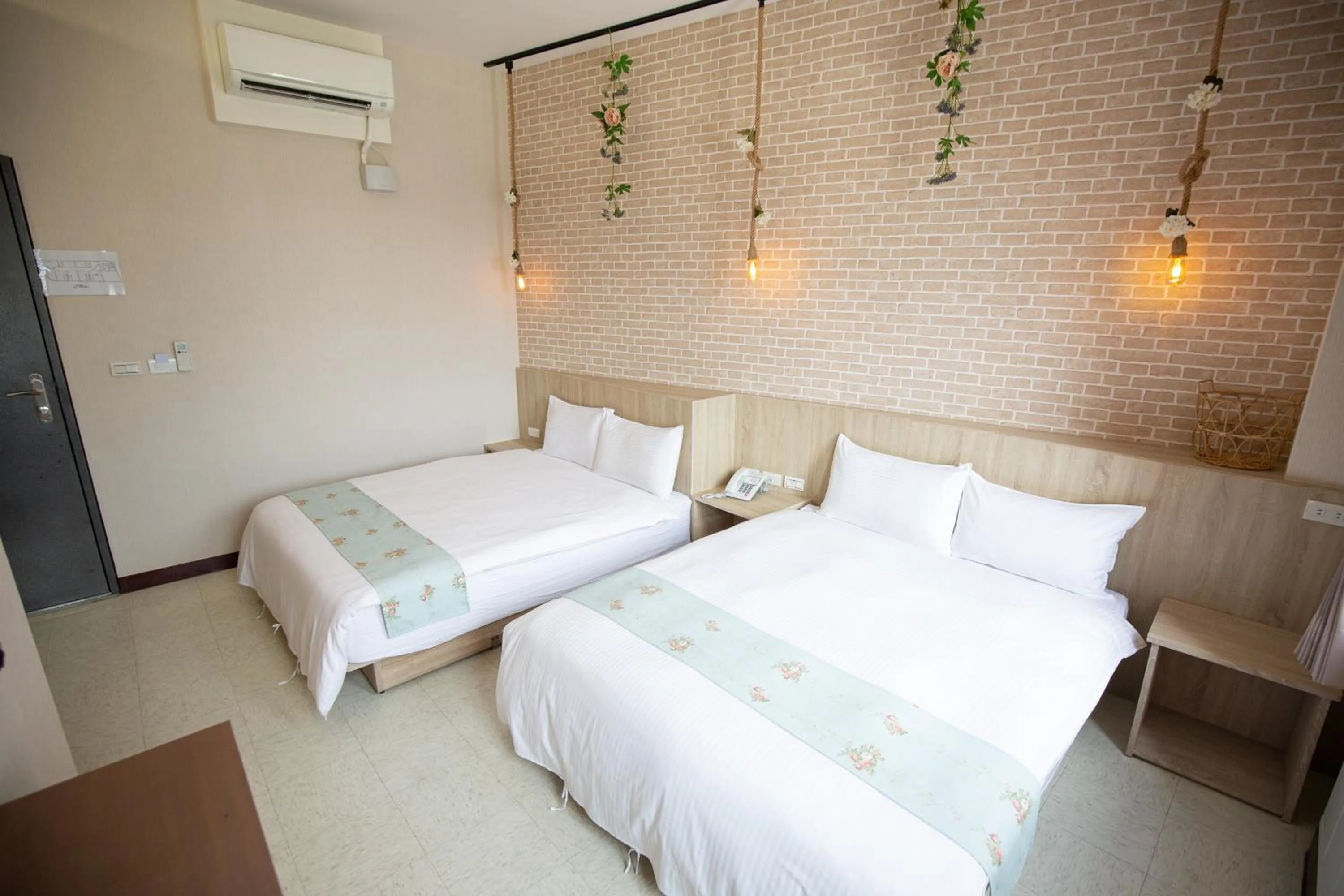 Bed in Jia-Jia Business Hotel