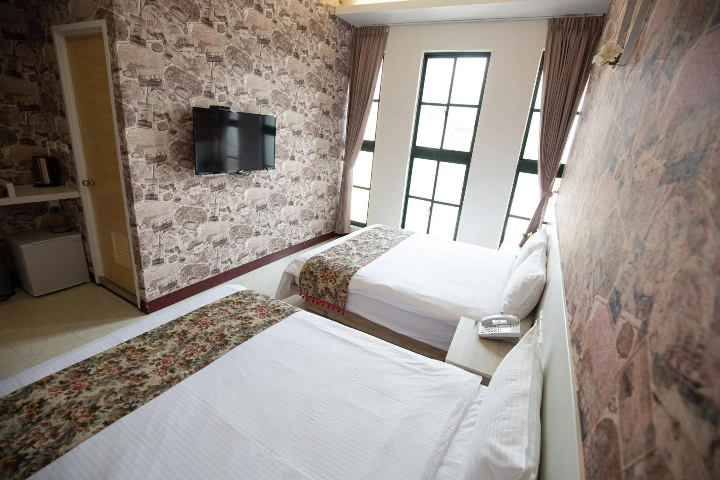 Bed in Jia-Jia Business Hotel