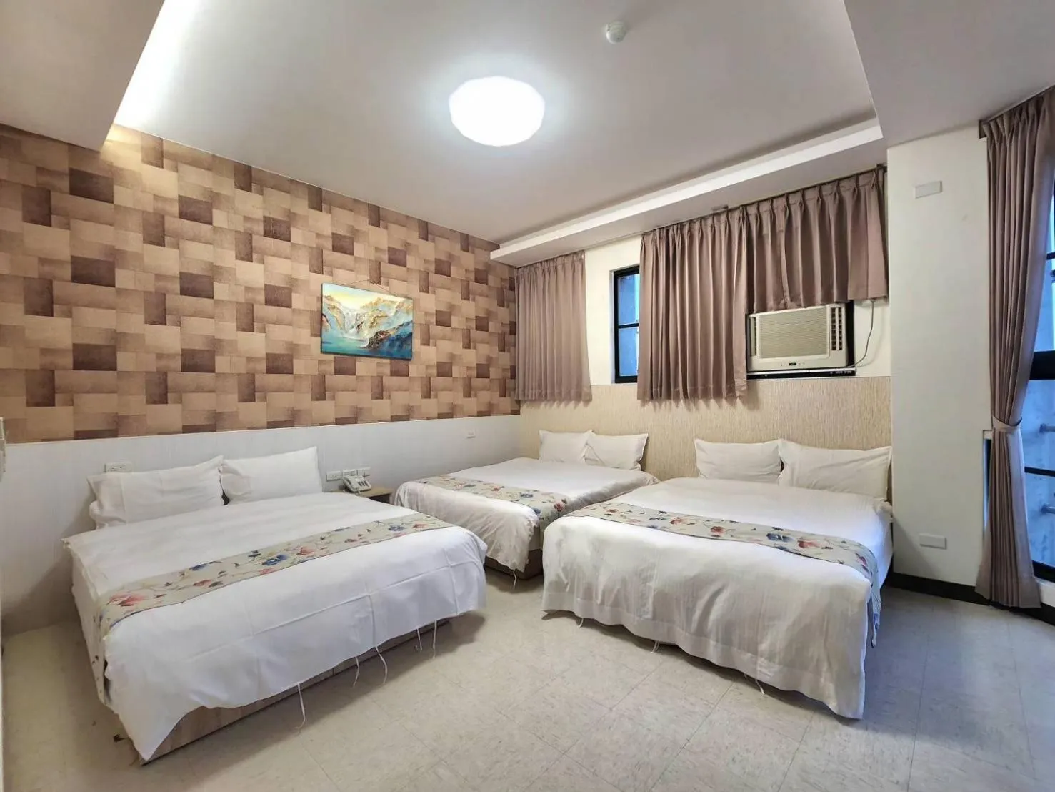 Bed in Jia-Jia Business Hotel