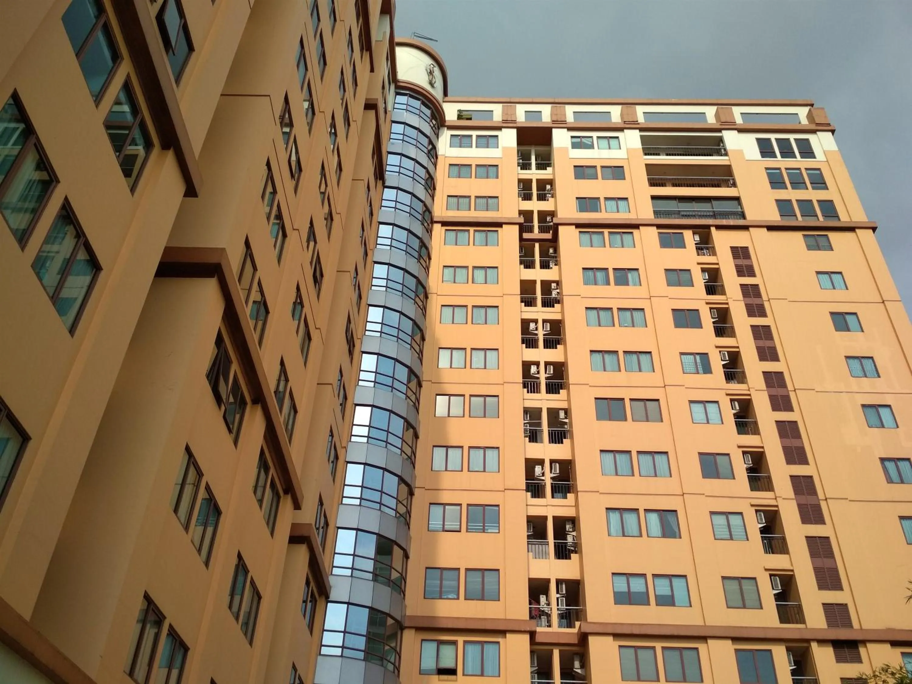 Property building in Antique 3BR at Grand Setiabudi Apartment By Travelio