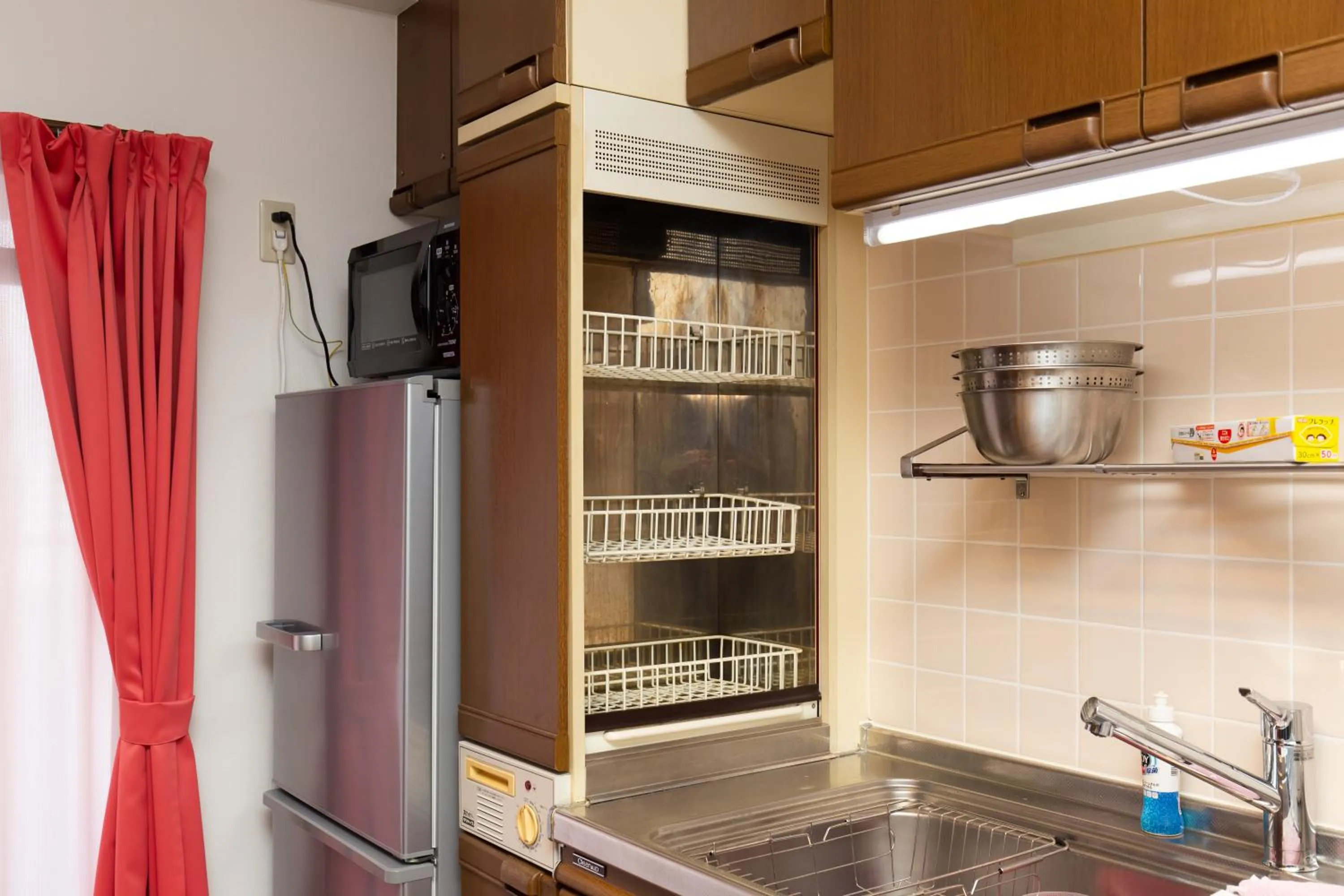Kitchen or kitchenette in Crest Daikoku Owner's room -vacation rental-