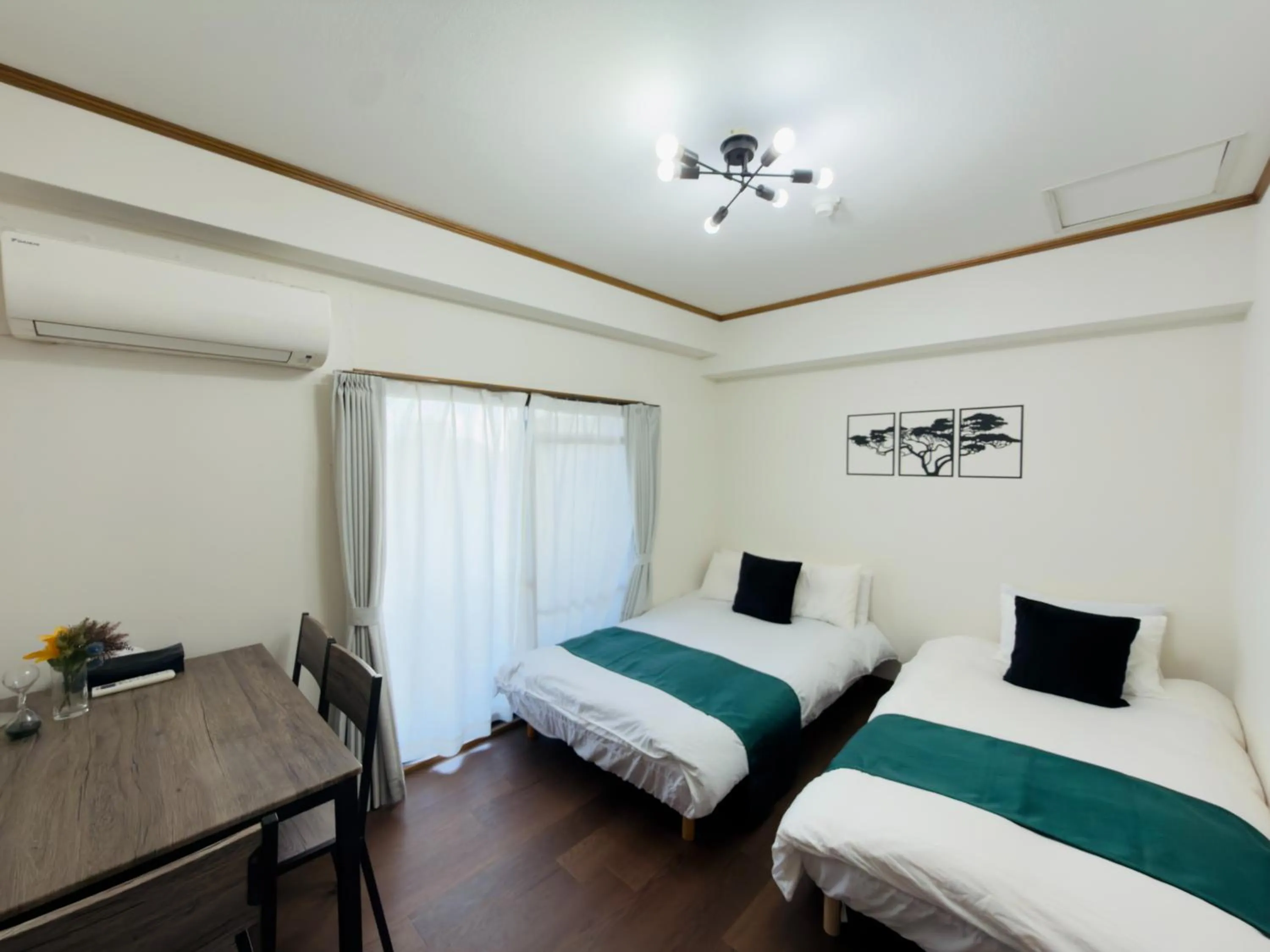 Bed in Crest Daikoku Owner's room -vacation rental-