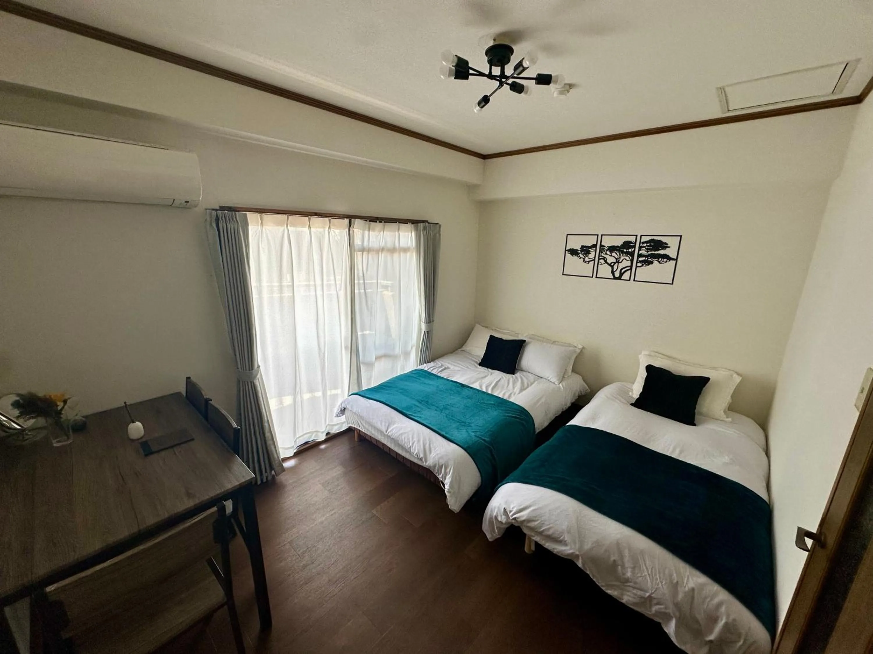 Bed in Crest Daikoku Owner's room -vacation rental-