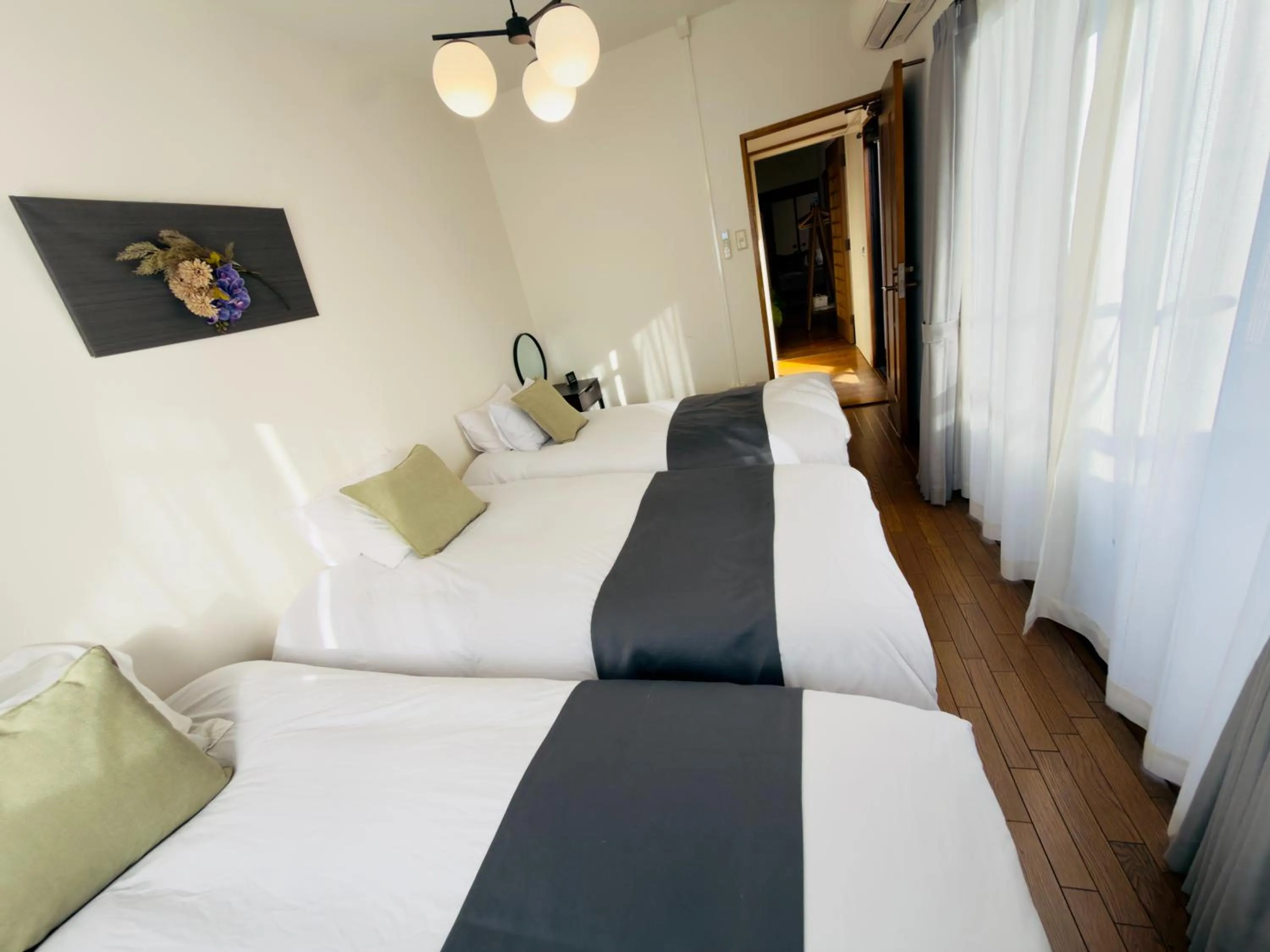 Bed in Crest Daikoku Owner's room -vacation rental-