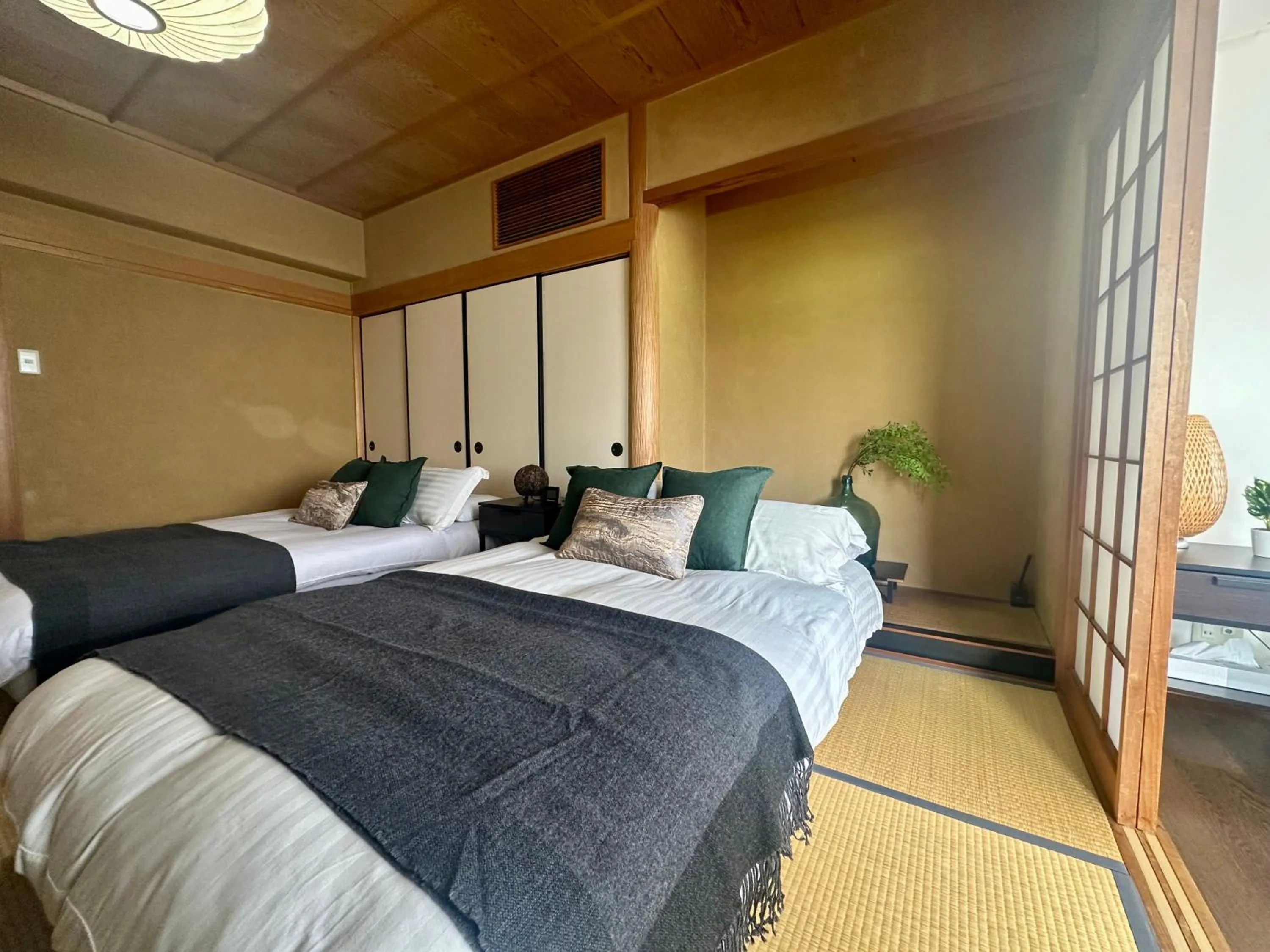 Bed in Crest Daikoku Owner's room -vacation rental-