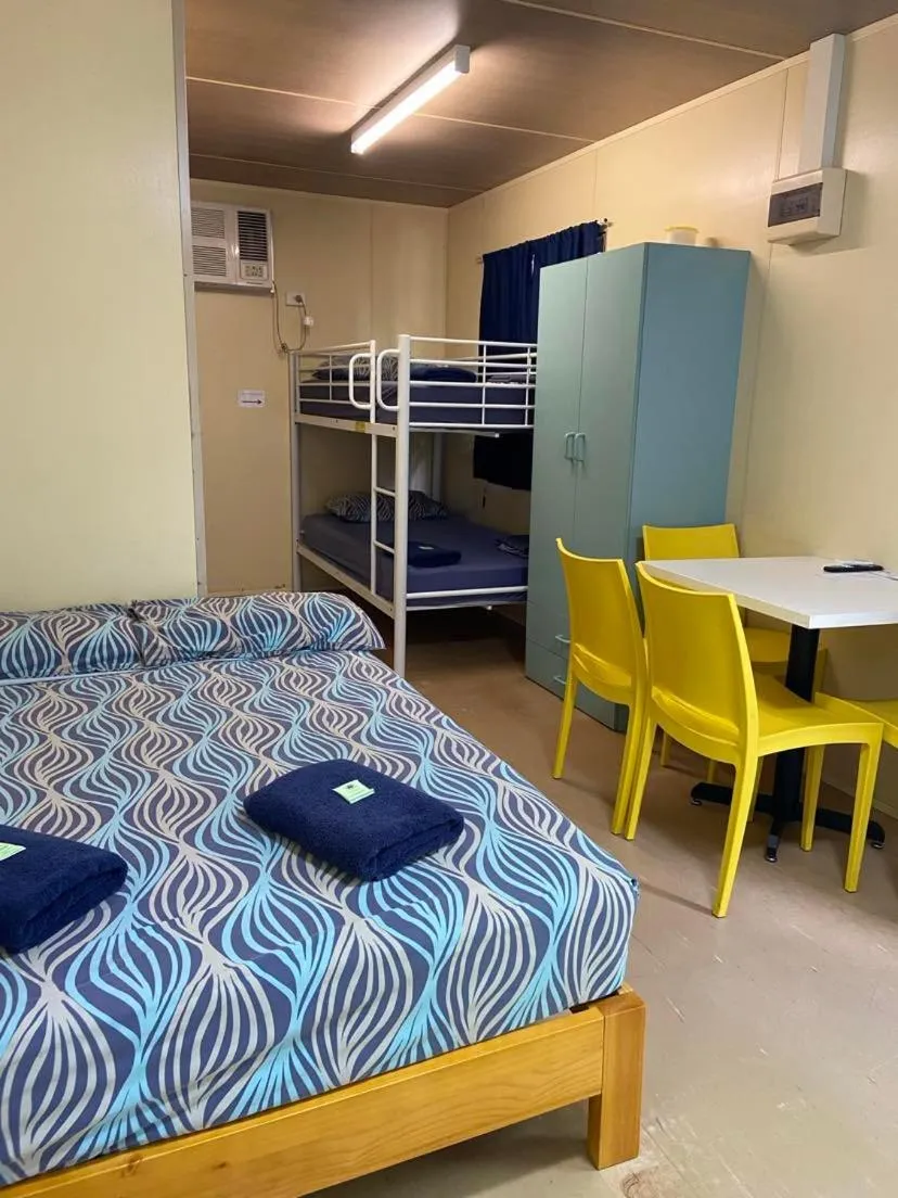 Seating area, Bed in Riverview Tourist Village