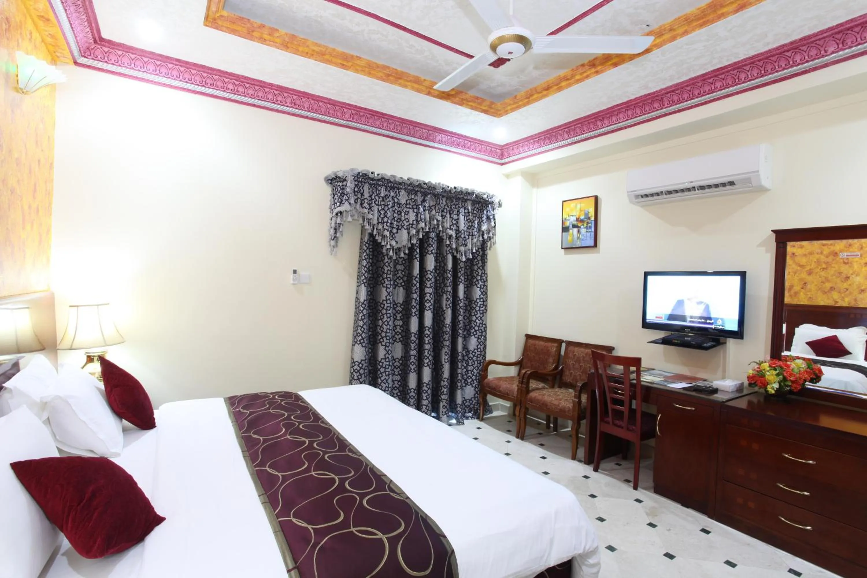 Photo of the whole room, Bed in Al Bahjah Hotel