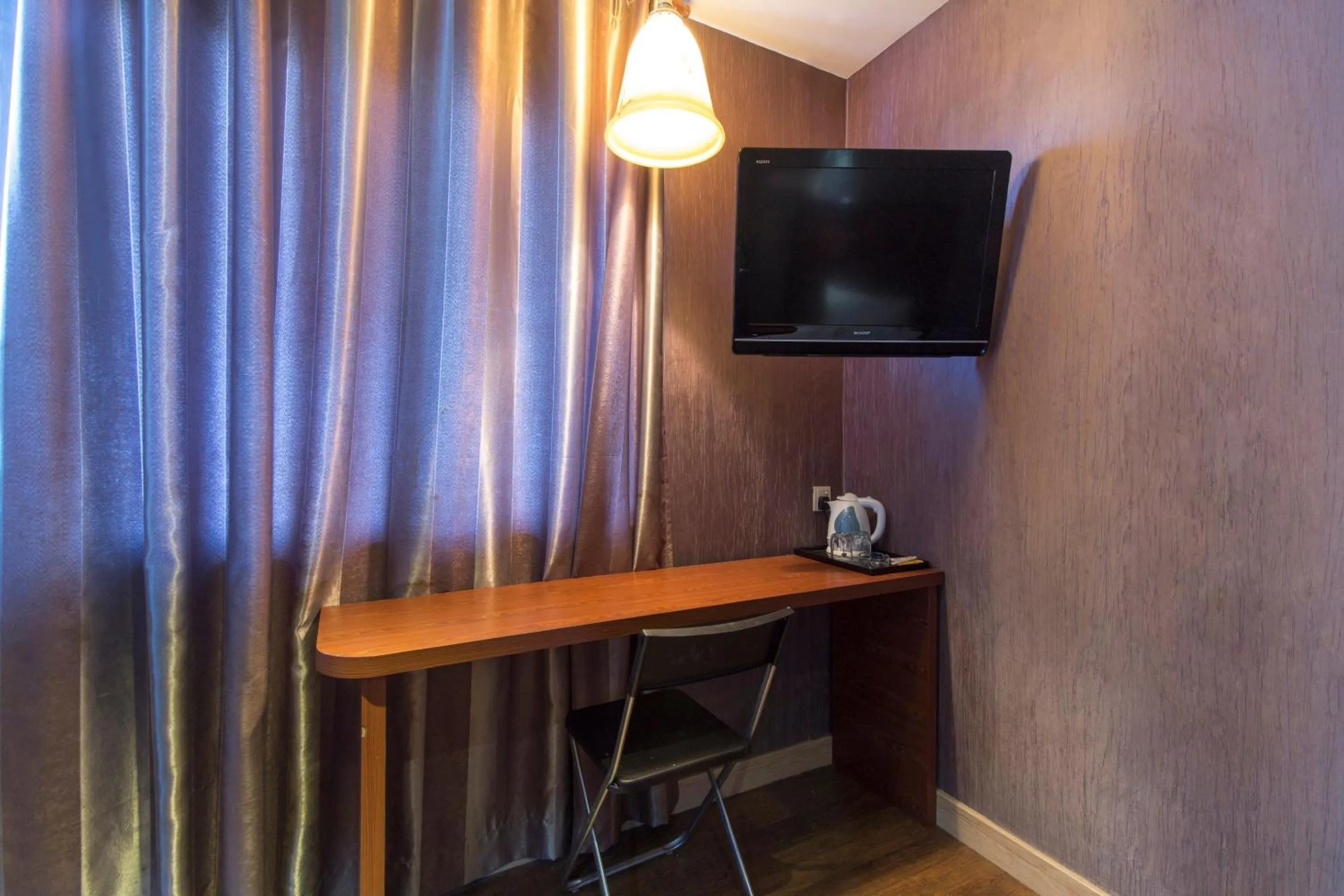 Bedroom in Hotel O Smc I-city