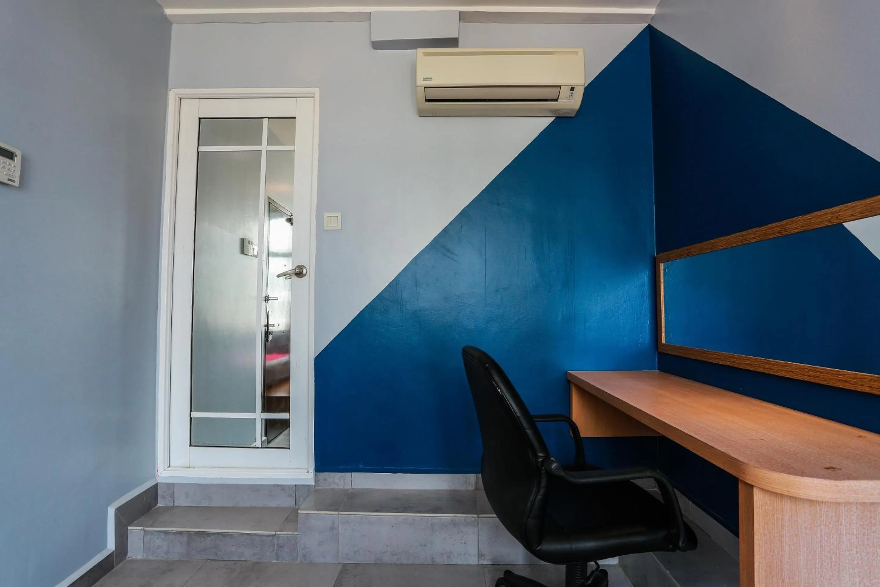 Bedroom in Hotel O Smc I-city