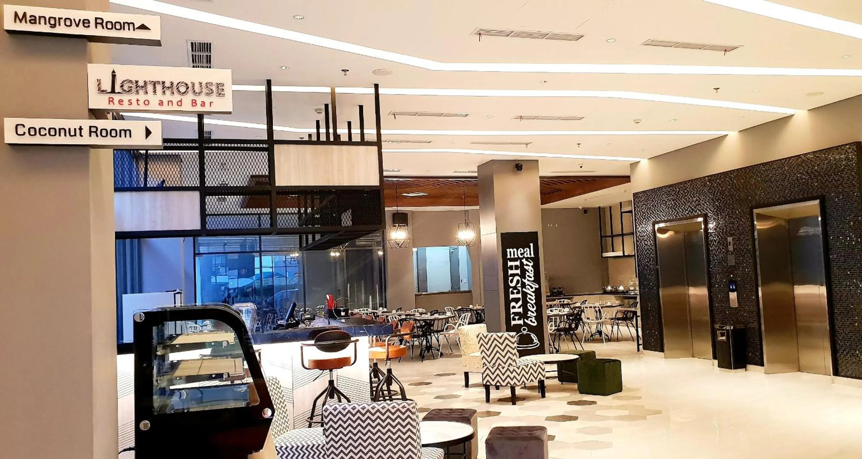 Communal lounge/ TV room in BW inn Belitung