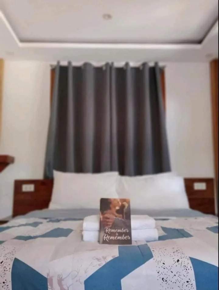 Bed in Descanso En Paraiso Resort